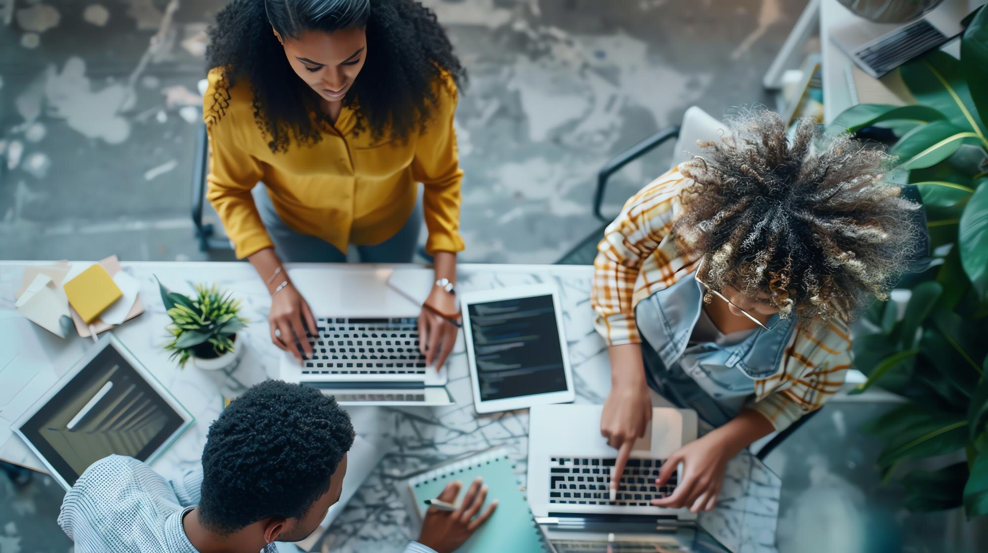 top view of diverse business team working together 7b22d69be7d653462d5a