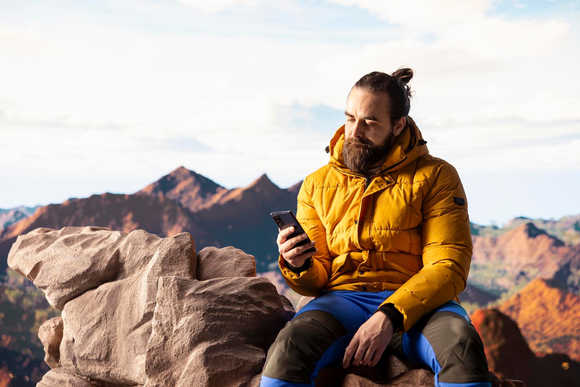 traveler in warm clothing scrolling social media o 4e848c565608688d57a2