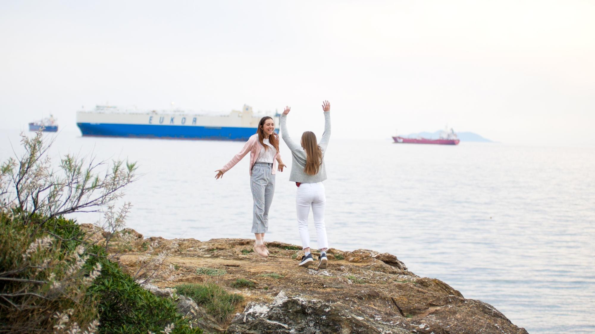 two young attractive women dancing on the rocky sh a0133678b5424dc29e26 BTOURS