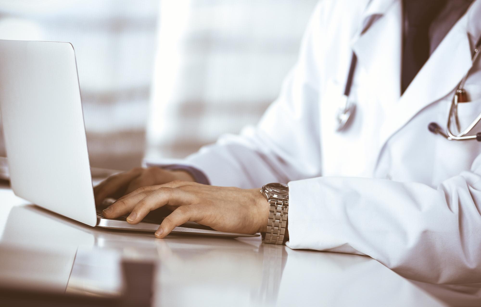 doctor working to resolve inefficiencies