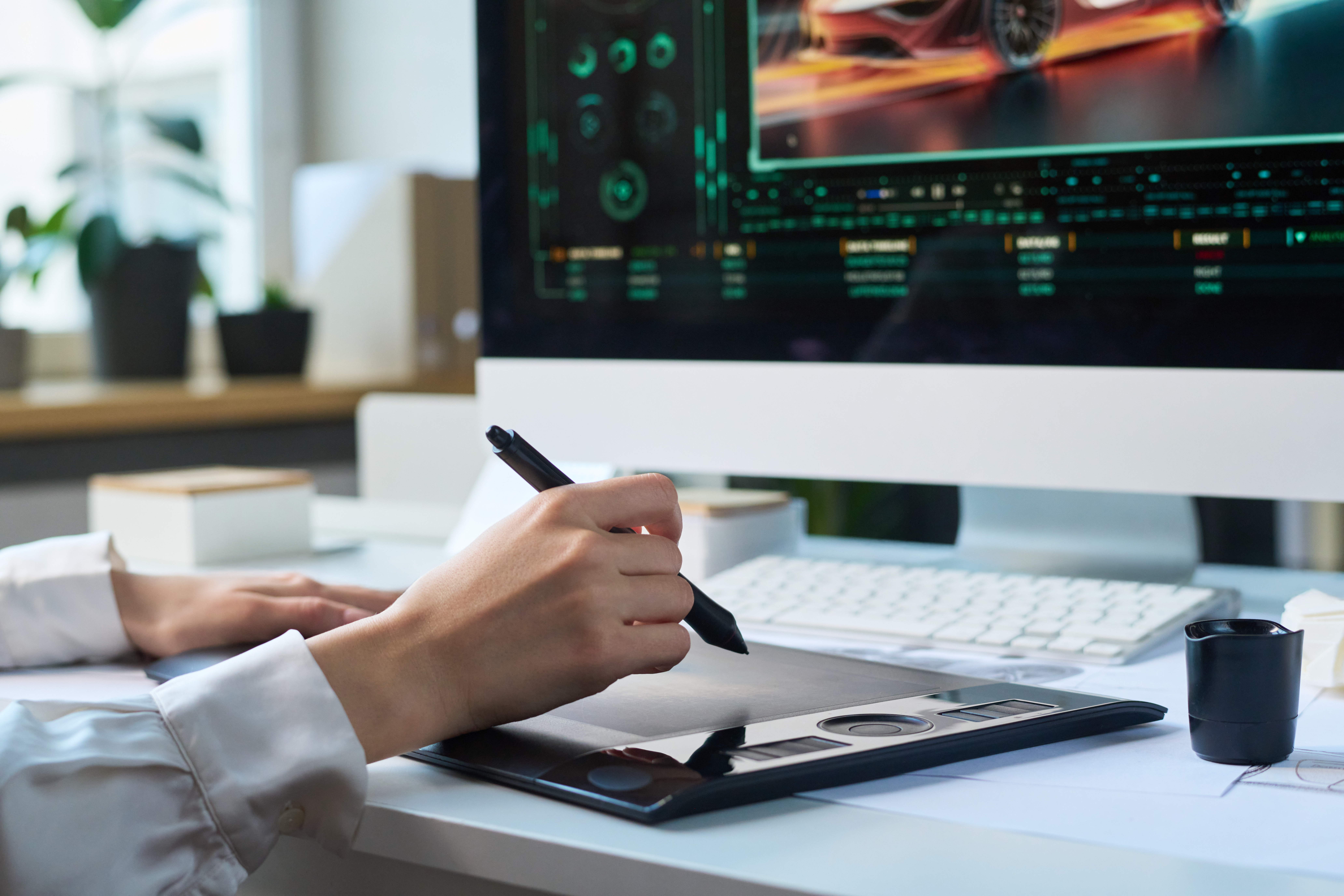 unrecognizable designer drawing model of new car ad7a816c8ab42c45f81b