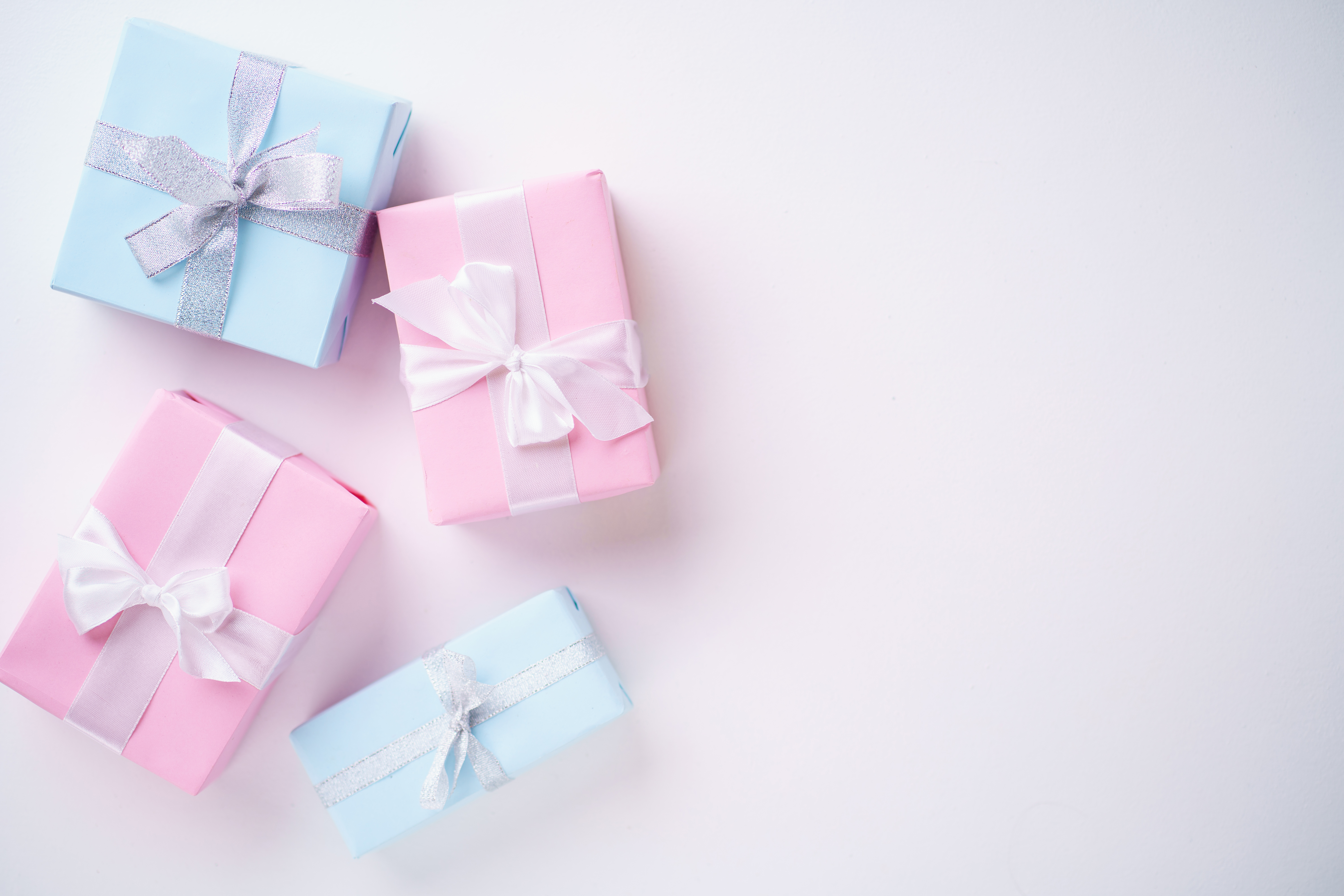 gender reveal presents with bows