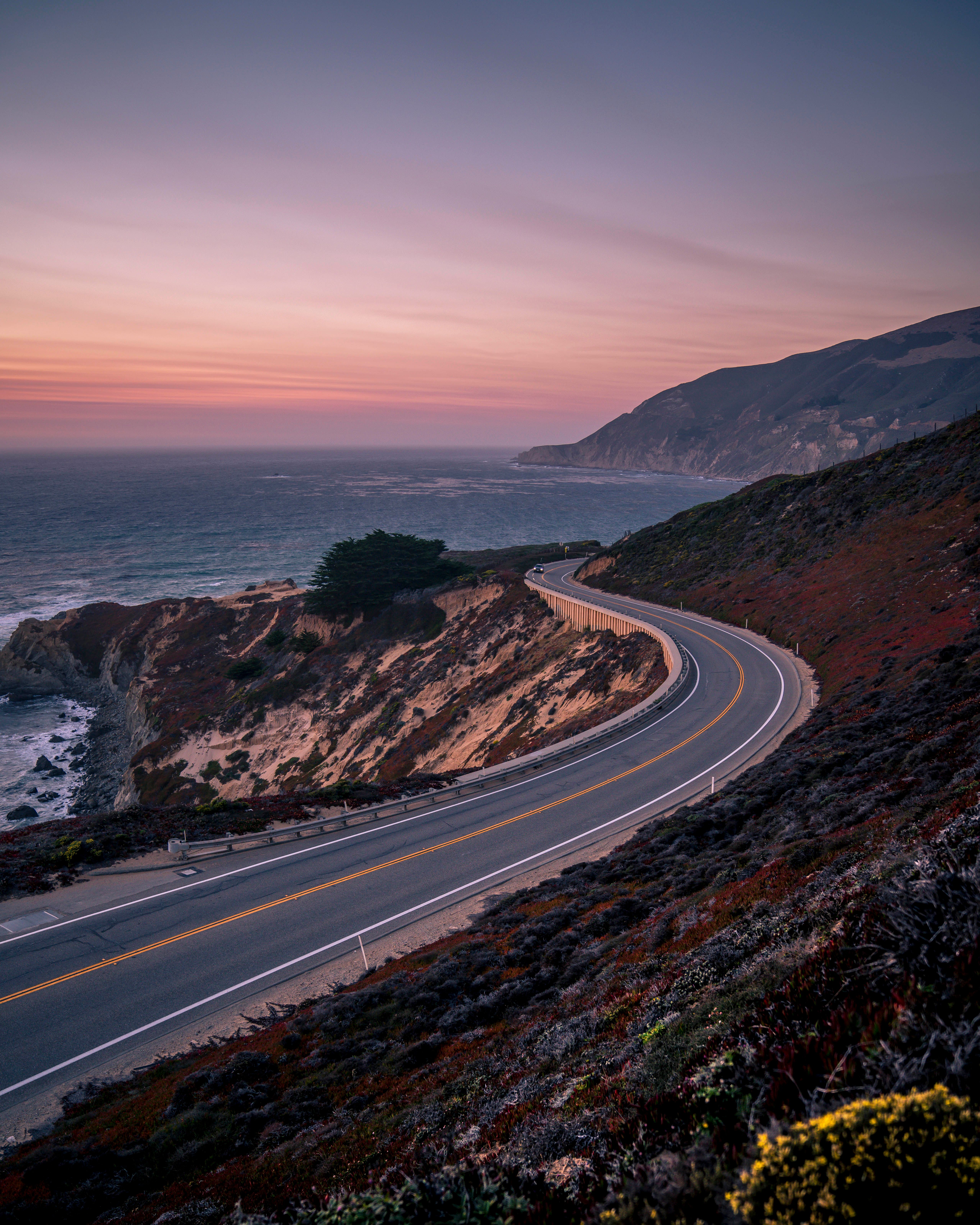 vertical shot of pacific coast highway surrounded 684baf1748842efd66ab BTOURS