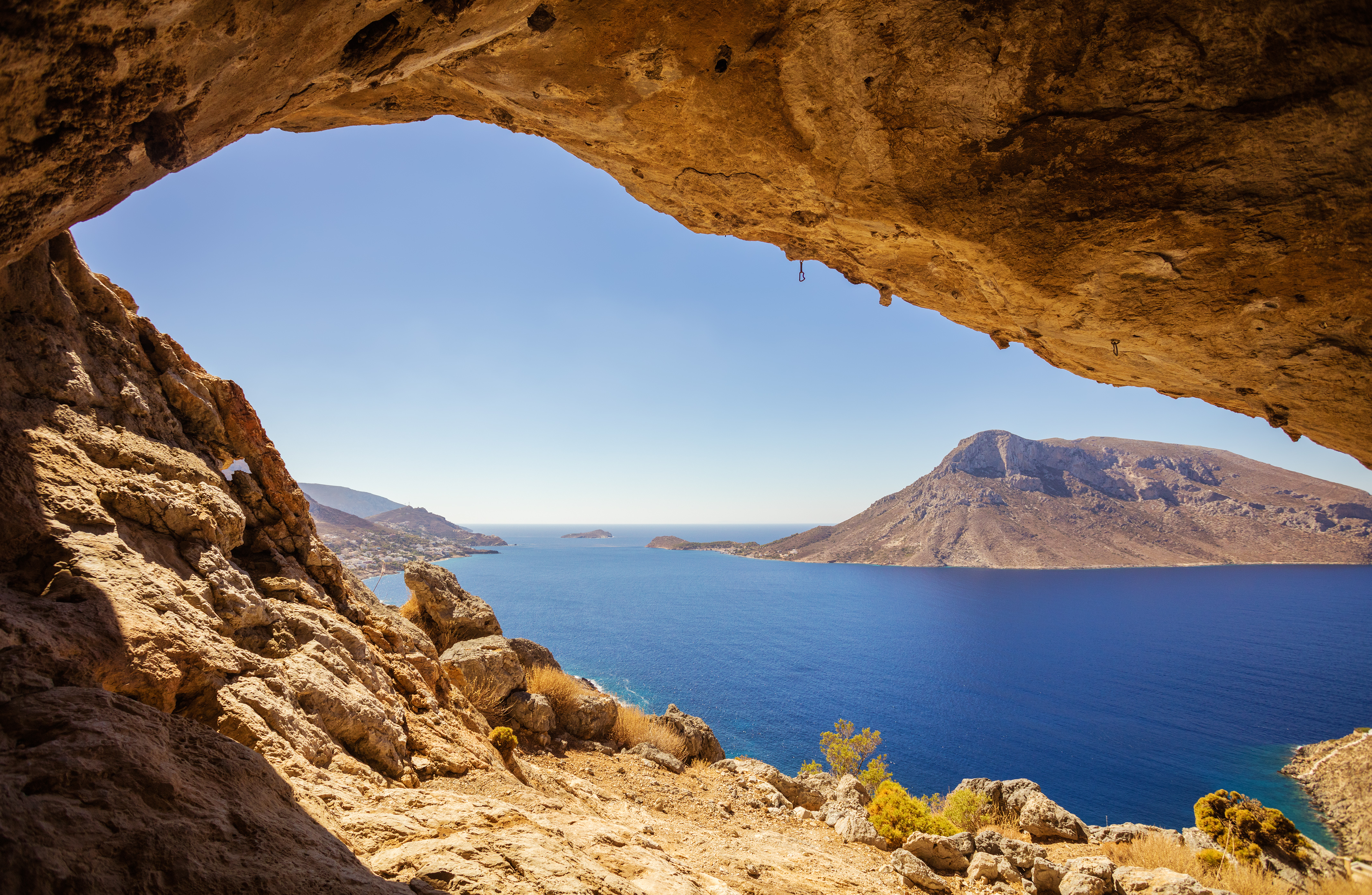 view of telendos island from a cave in a cliff a8ae83fd5ec9f41ce80e BTOURS