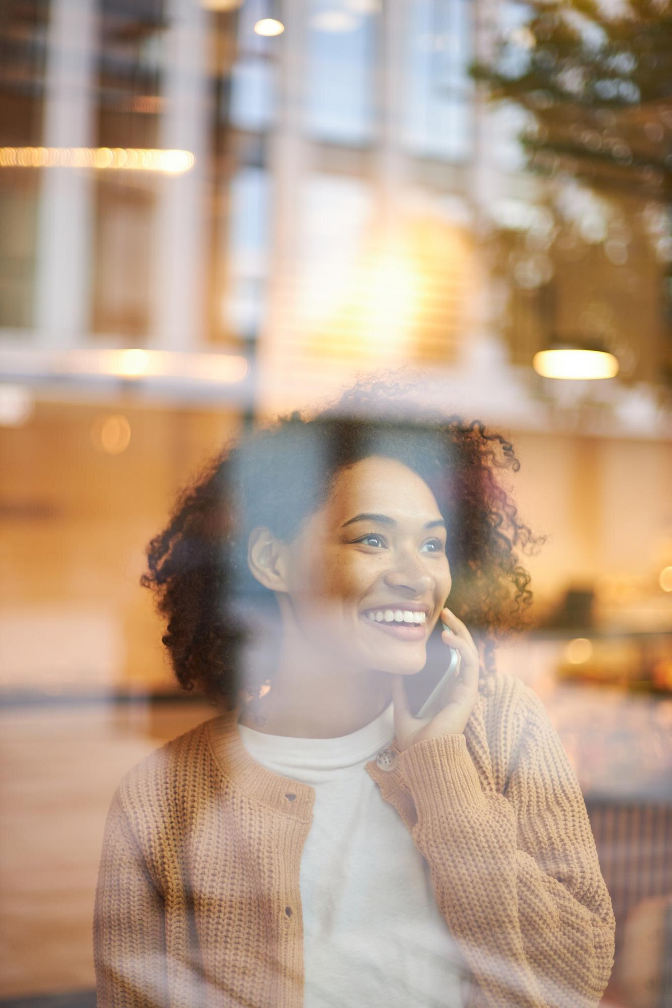 view through the window to a cheerful african amer cc208884f5470490f488
