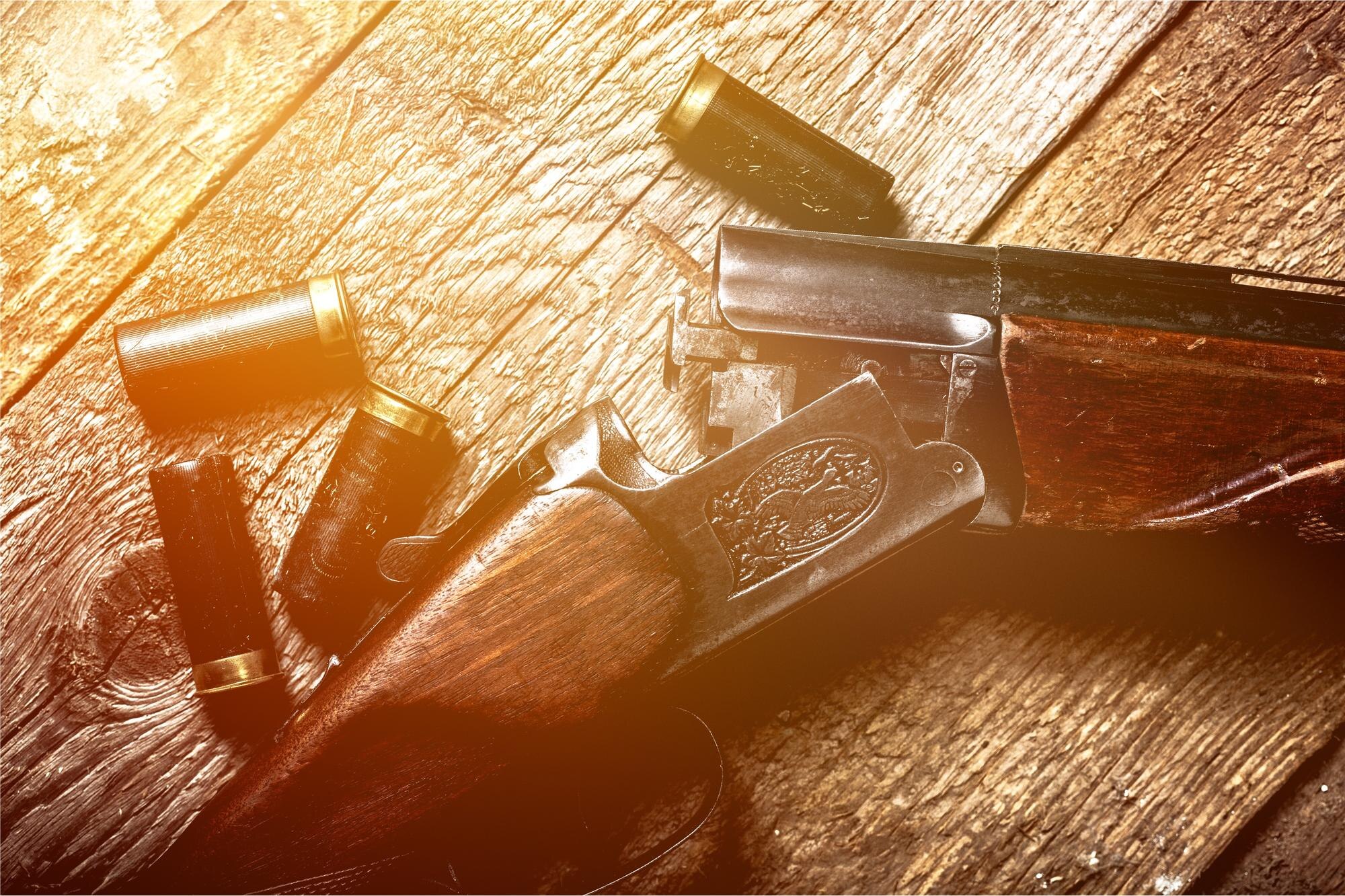 vintage rifle and sleeves on wooden table 4fa6fc58e5663ca6e50b