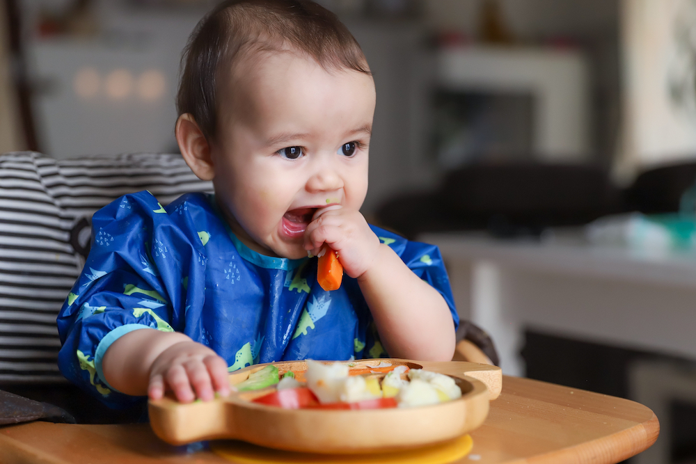 baby eating food