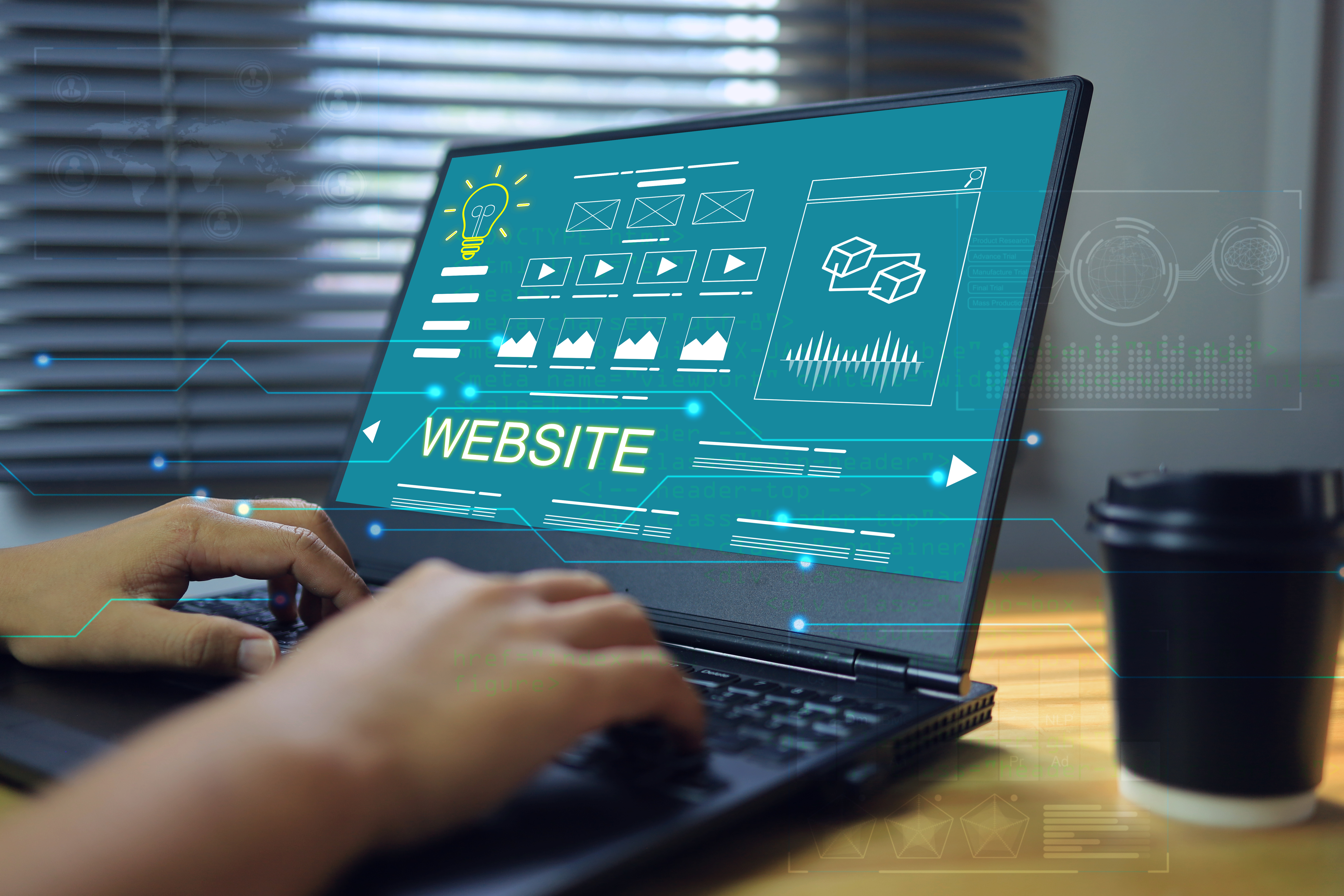 A person typing on a laptop displaying a website interface, representing the process of improving site structure and design for stronger SEO performance.