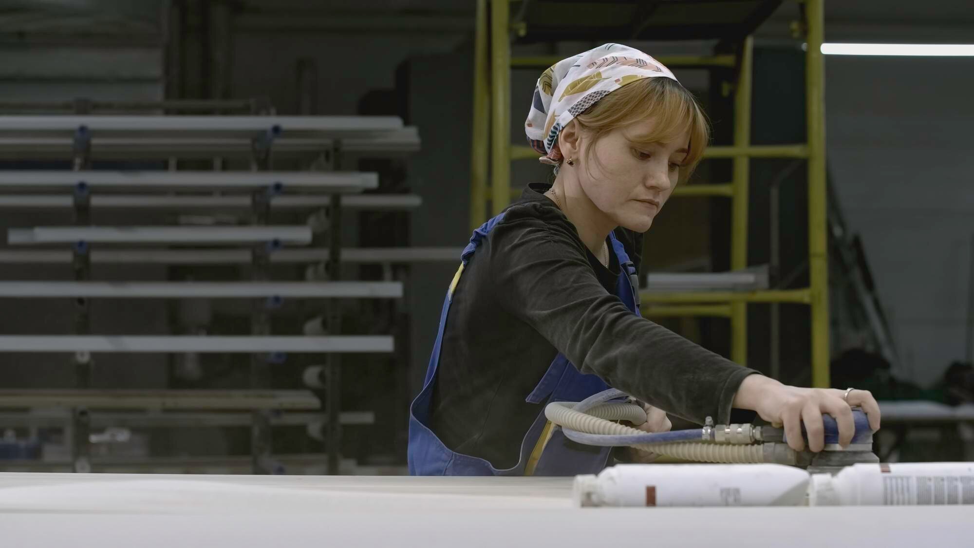 Bulk Custom Plastic Fabrication: Essential Tips to Order Right (and Avoid Hold-ups) 3 woman grinds wood in workshop creative young woman 67e52726fbe06c89ffea