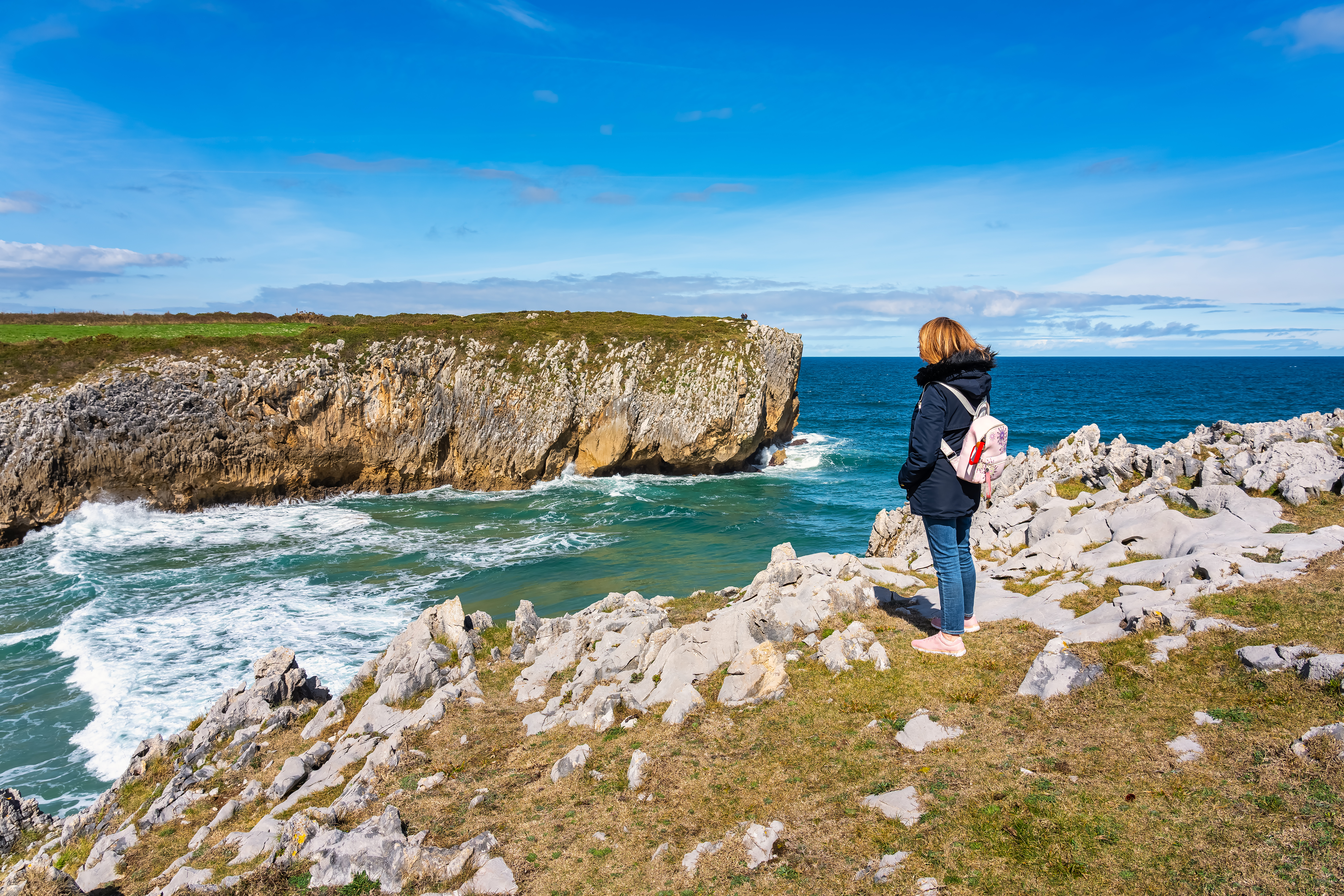 woman hiking high on the cliffs of northern spain df6bf272b166ebd52b74 BTOURS