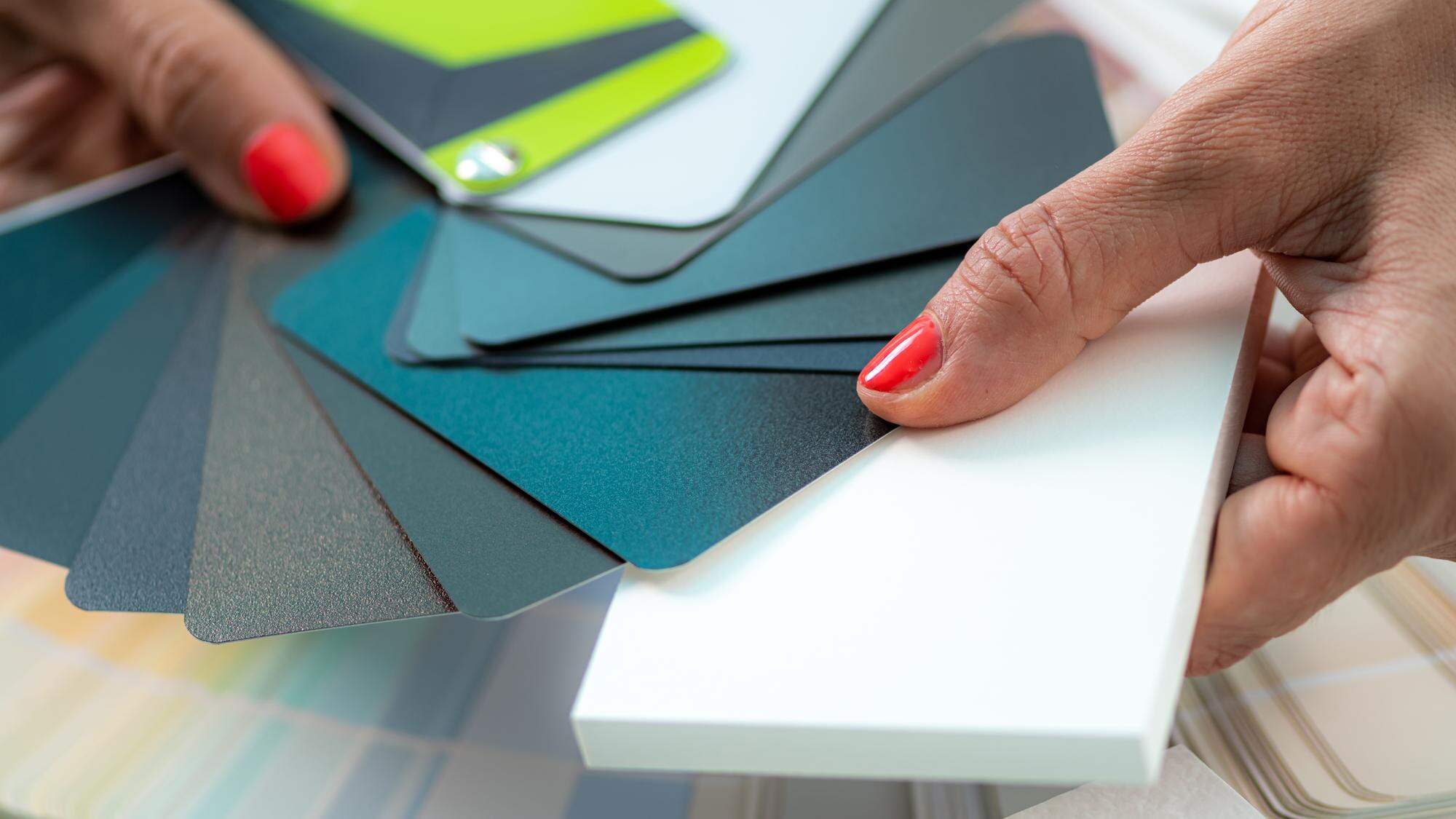 The Ultimate Guide to Choosing the Right Plastic Material for Your Custom Fabrication Project 2 woman looking at color palettes for interior decor 23376905c9d59653cce0