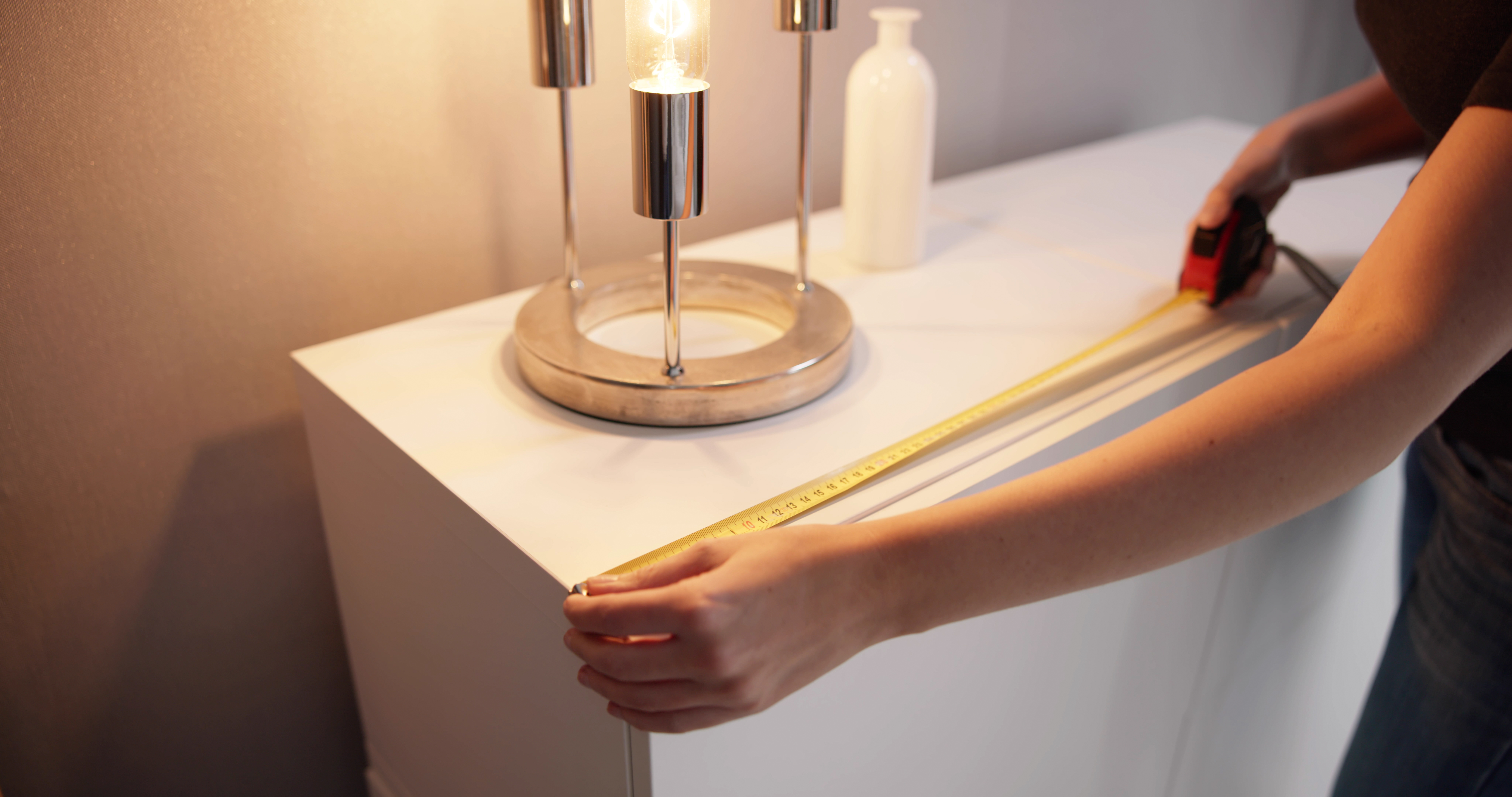 Measure Twice, Order Once: How to Get Cut‑to‑Size Plastic Sheets Spot On 2 woman measuring furniture cabinet 3906c35309e430e5d7ba