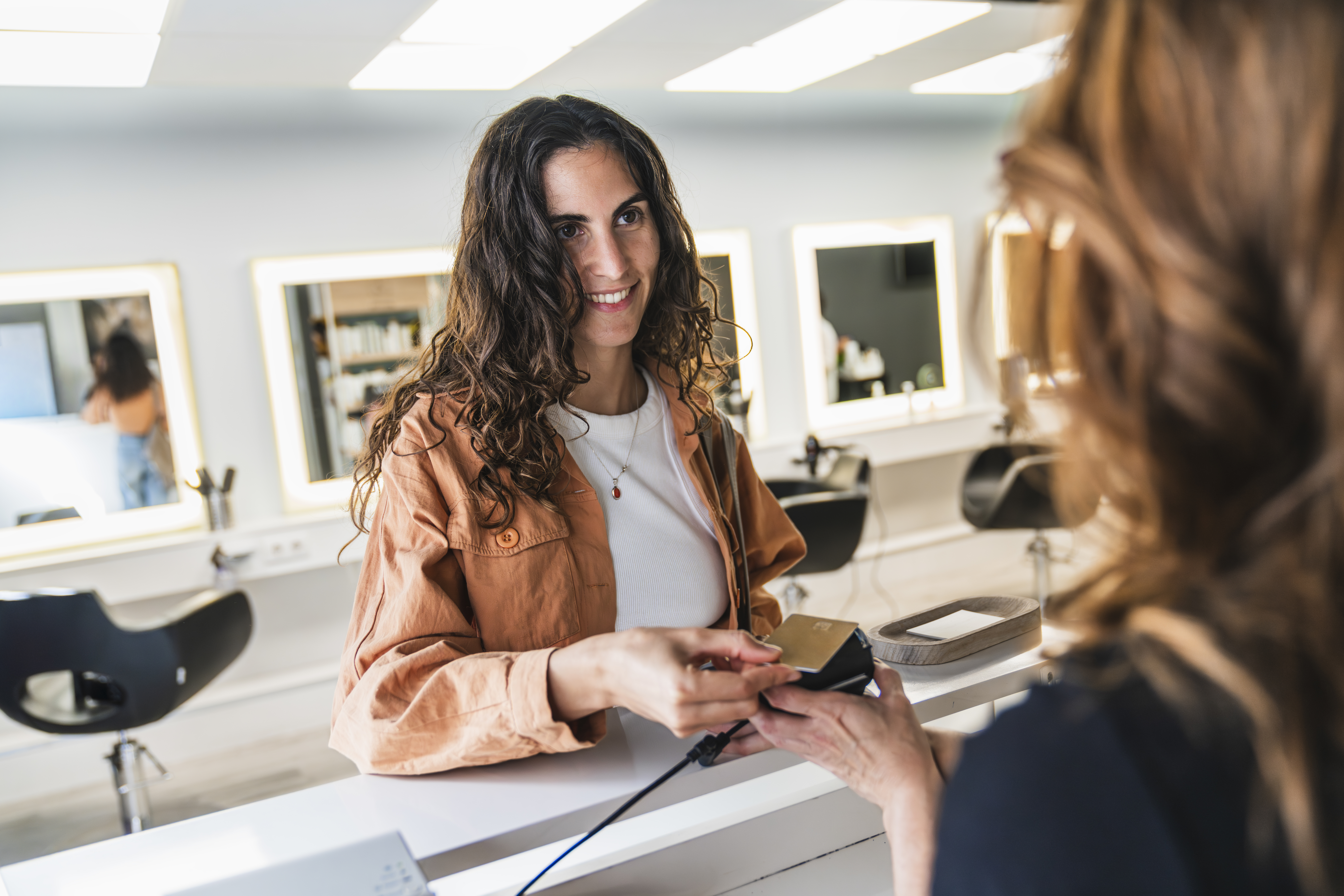 AI Receptionist for Small Business: What It Does, What It Costs, and Real Wins in Tampa, Los Angeles, New York, and Miami