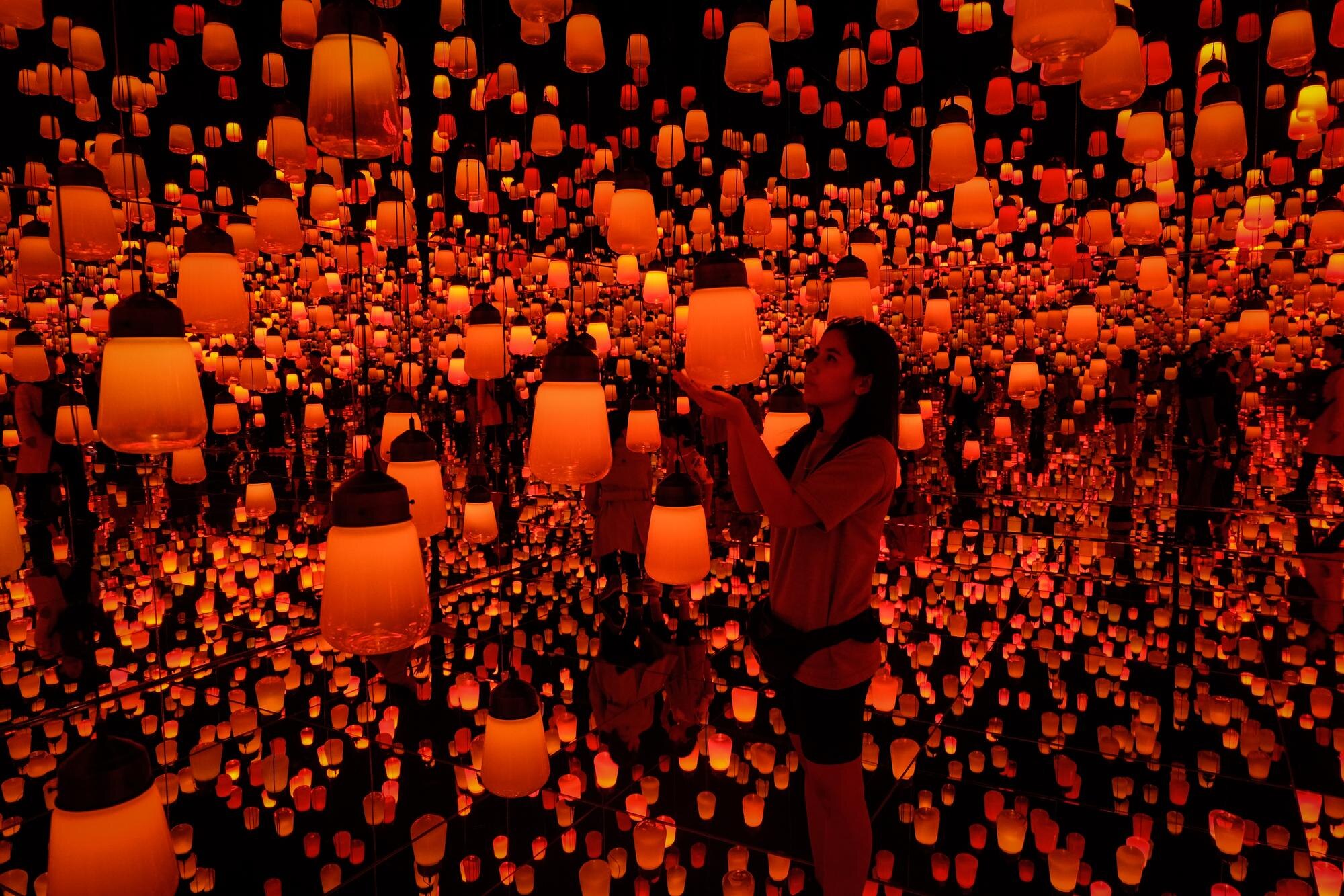 Creative Branding Strategies: How to Stand Out in a Crowded Market 2 woman standing by illuminated lantern at night 739ea93e8a2a7df6dbaa