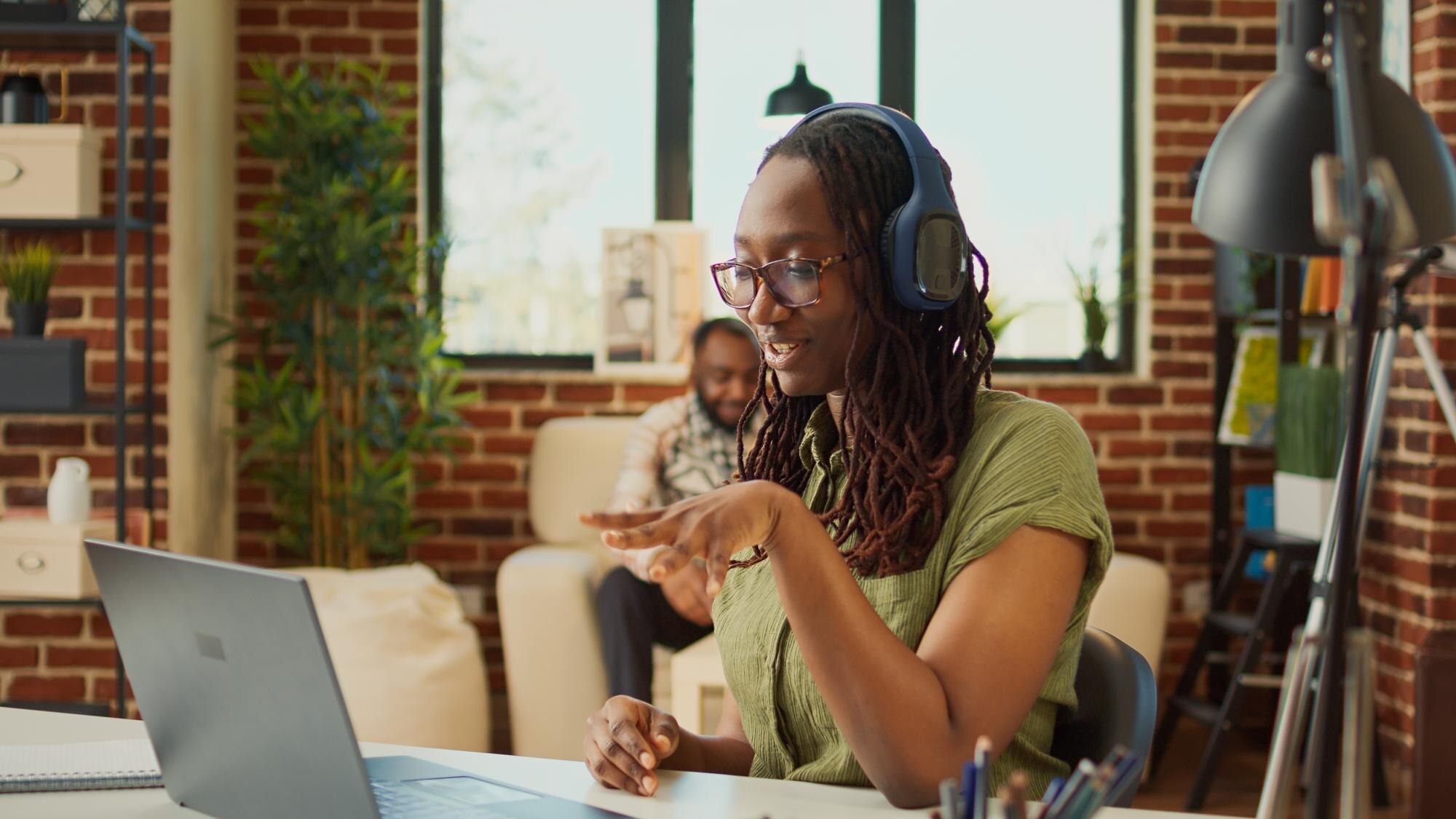 Navigating Imposter Syndrome in Remote and Hybrid Workspaces: Empowering Your Virtual Self Woman Talking To People On Online Videocall Meetin Cbb7a7a993edb8e82a4d