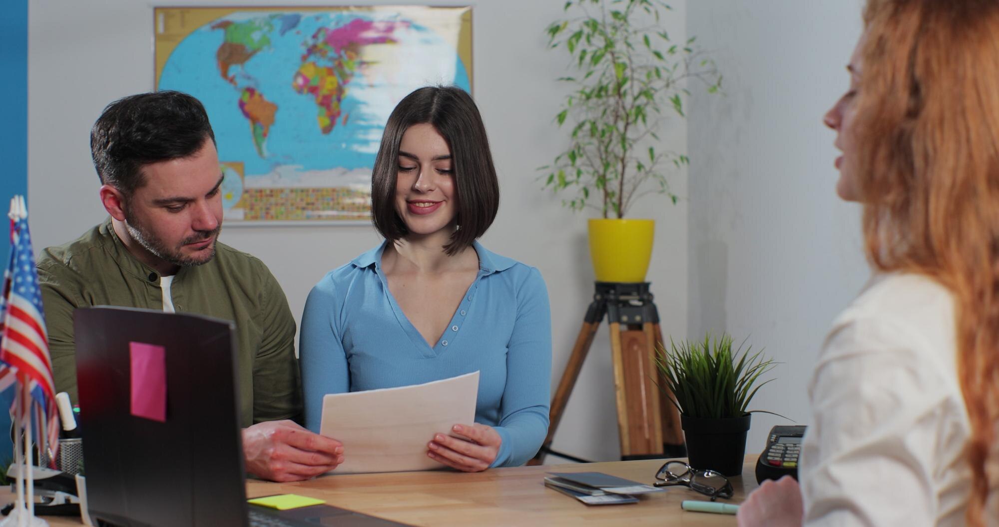 Woman Travel Agent Giving Visa Application To Youn 27F7249Fc400761206F3