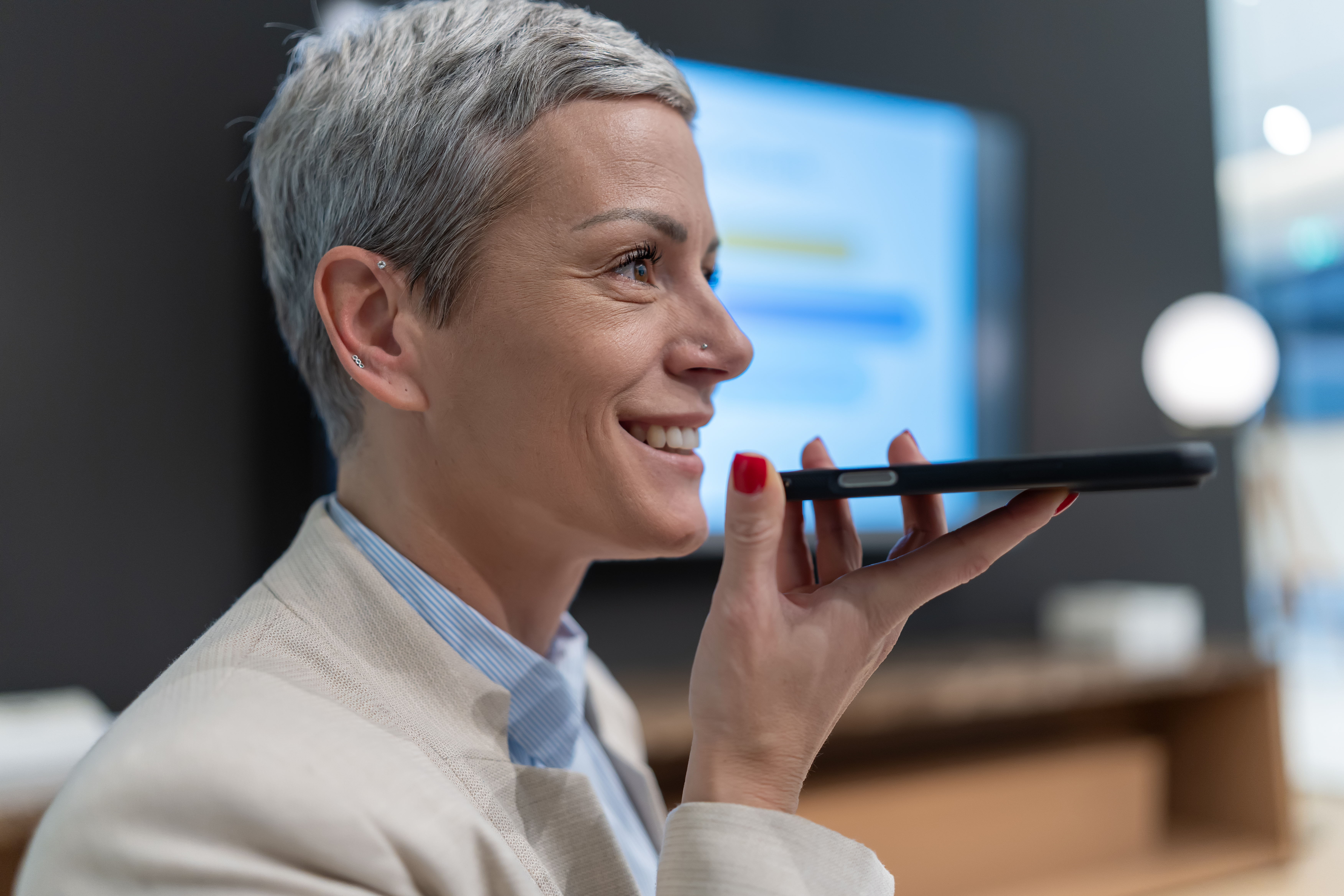 woman using smartphone for voice search technology 91b3065e1644fba5d21b
