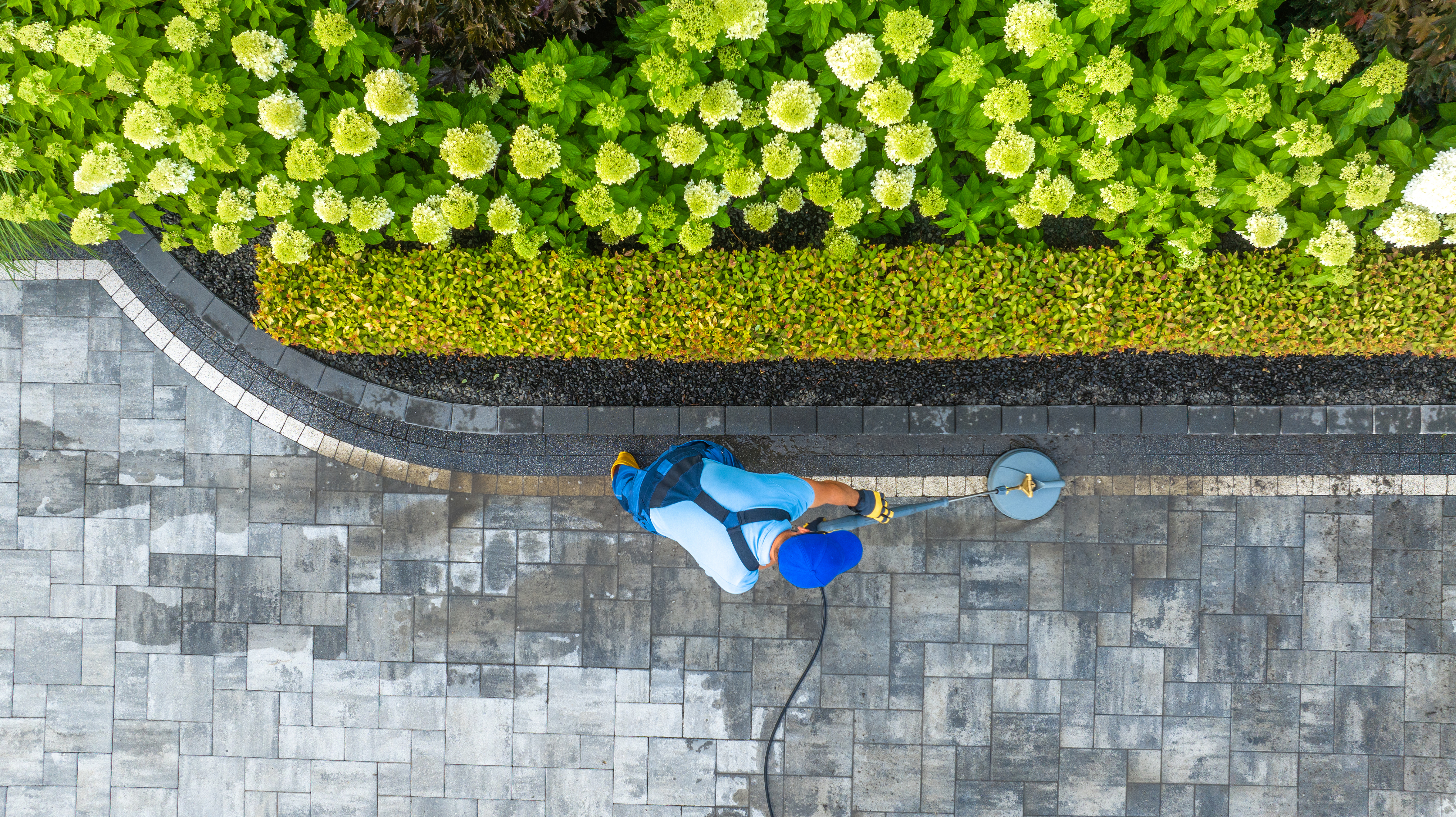 alt="pavers expert cleaning and sealing by calcleanseal"