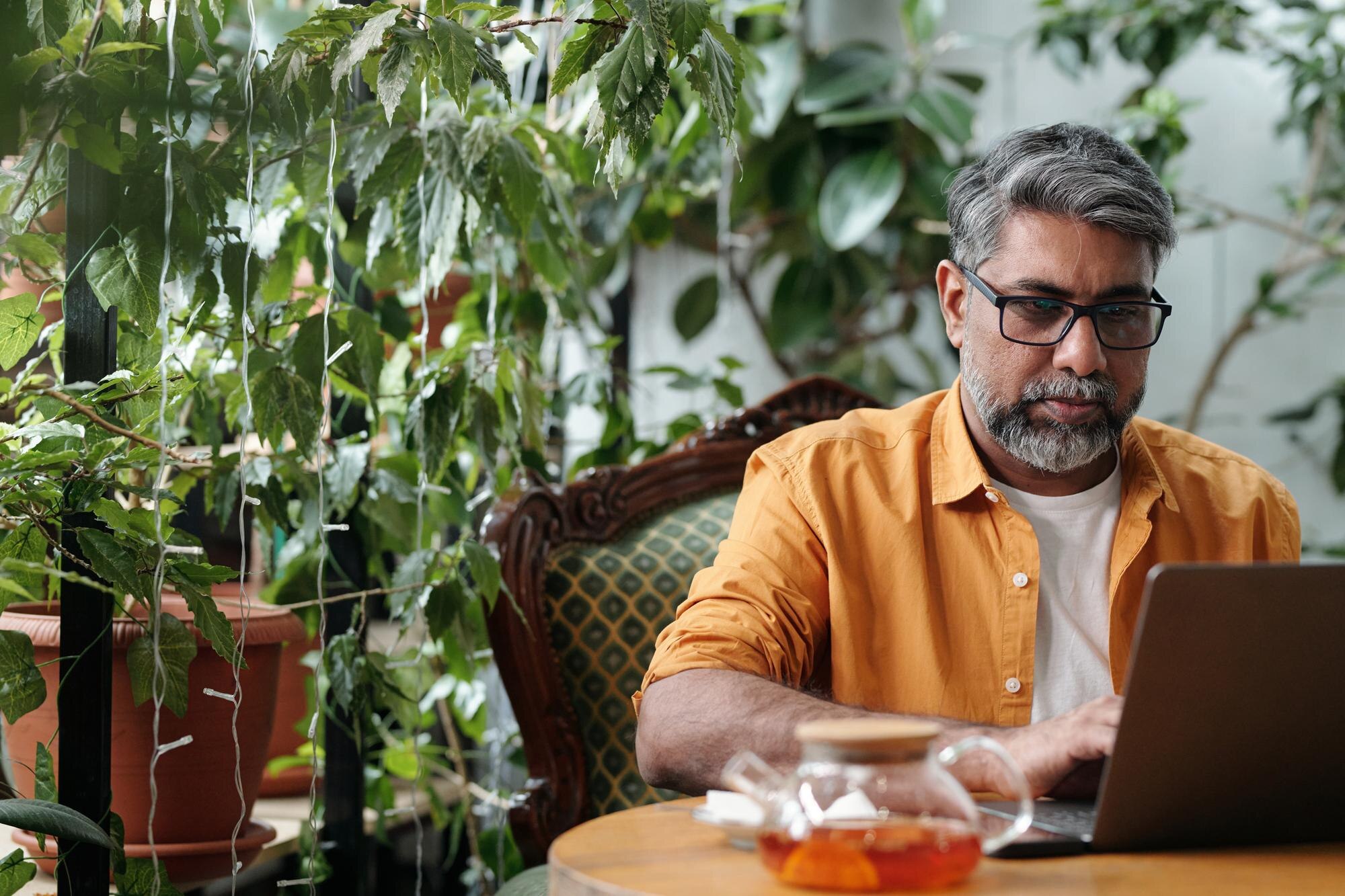 working from home surrounded by indoor plants a0d2b203ef38995e89f6