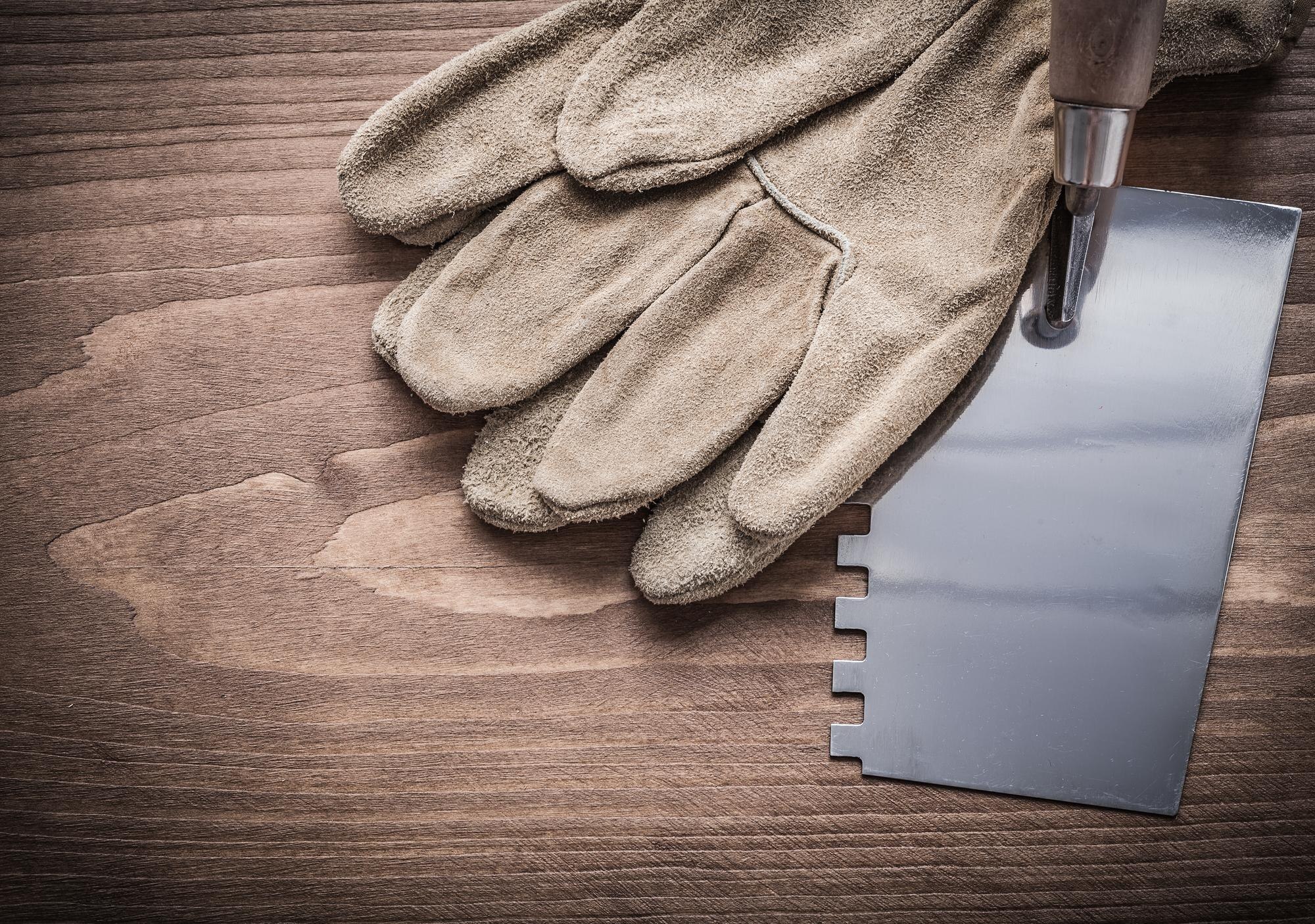 Affordable, winter‑ready plastic solutions for Aussie DIY & trade projects 2 working gloves and putty spattle on wood board 36e982b450ec2762d799