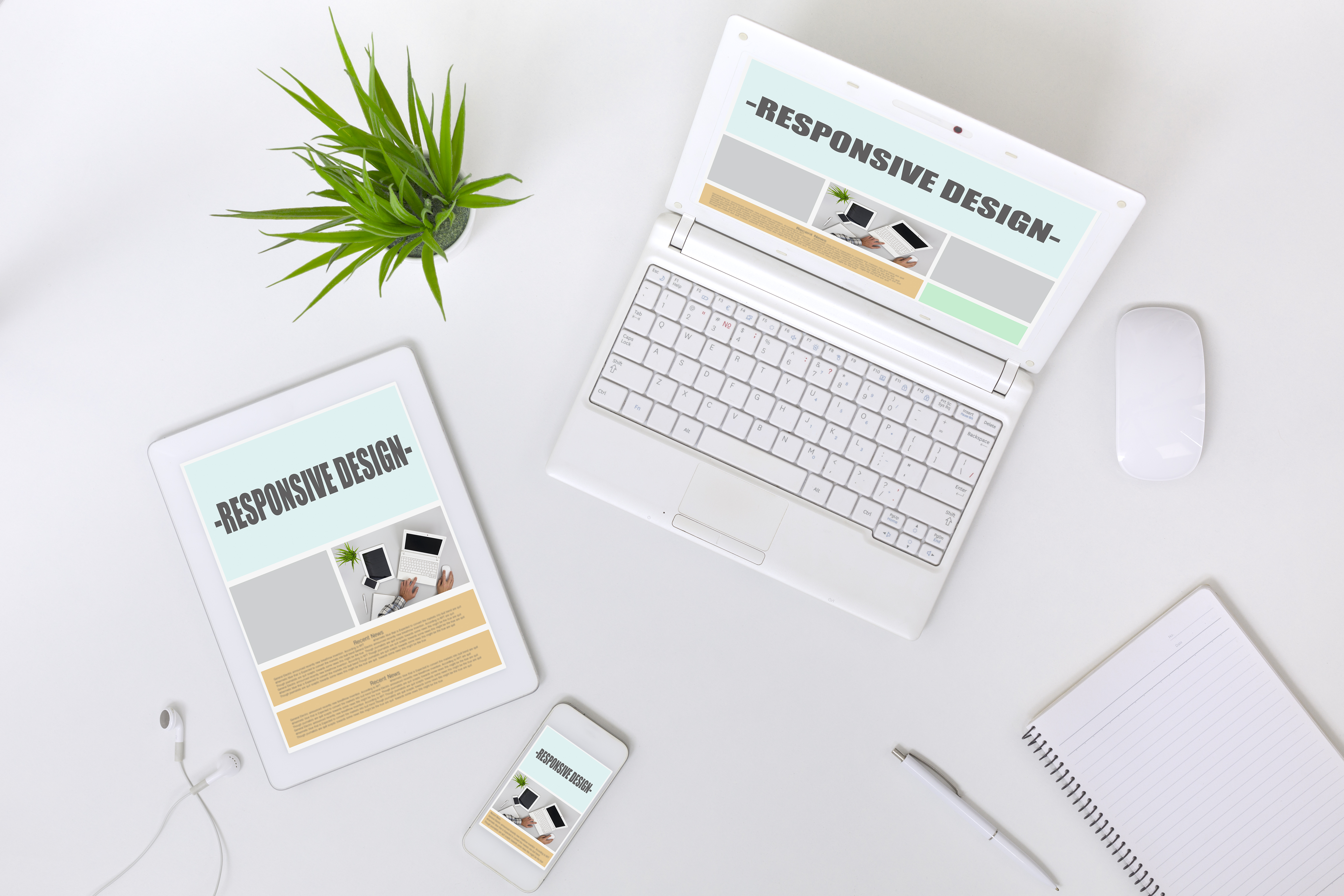 working place of web designer on white table top v b2fed6d76e70bc79ab94