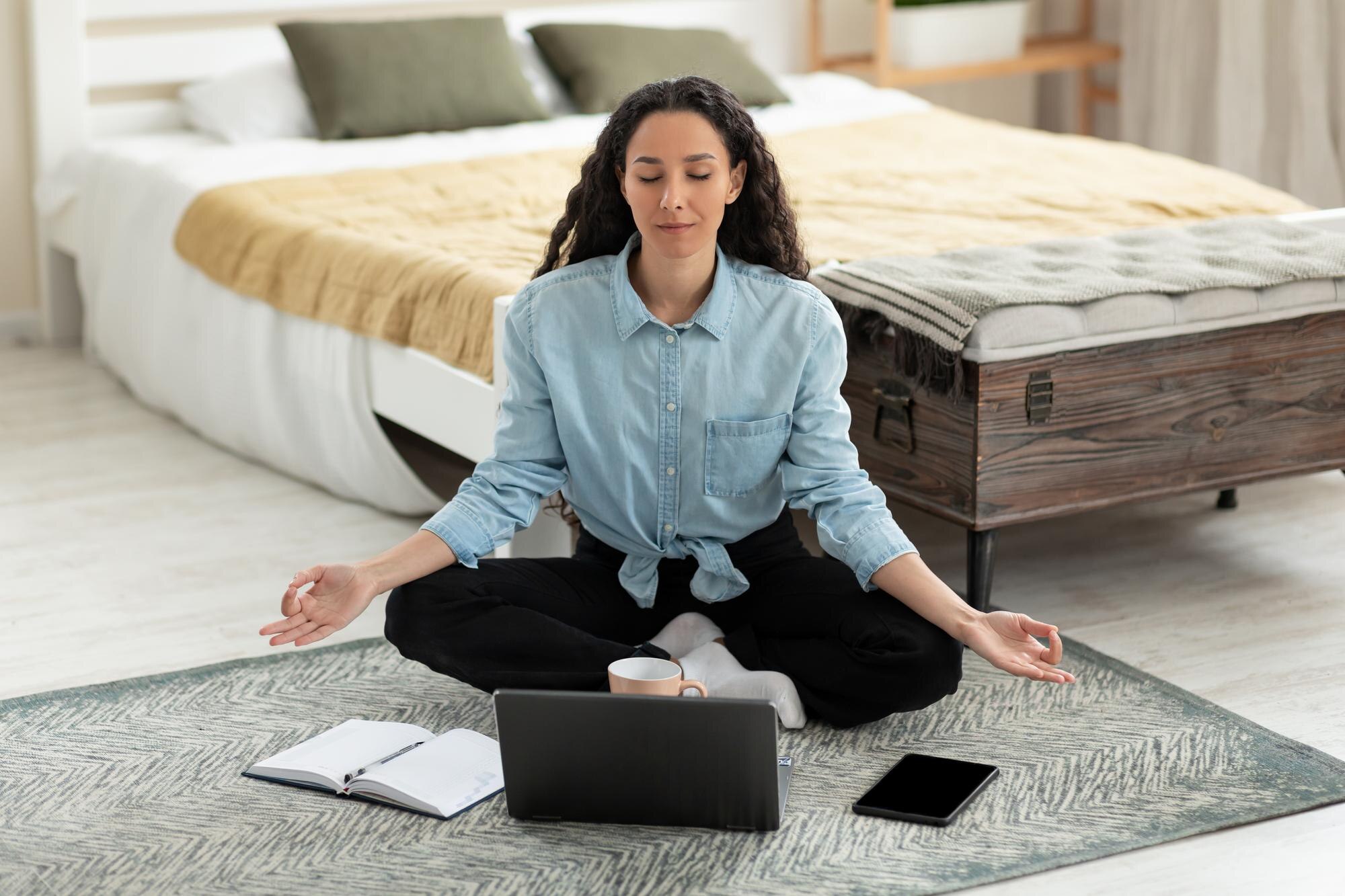 Mindful Money: How Mindfulness Transforms Financial Decision-Making 5 workplace stress management calm young woman medit 9e1664a6590f391b9b9a