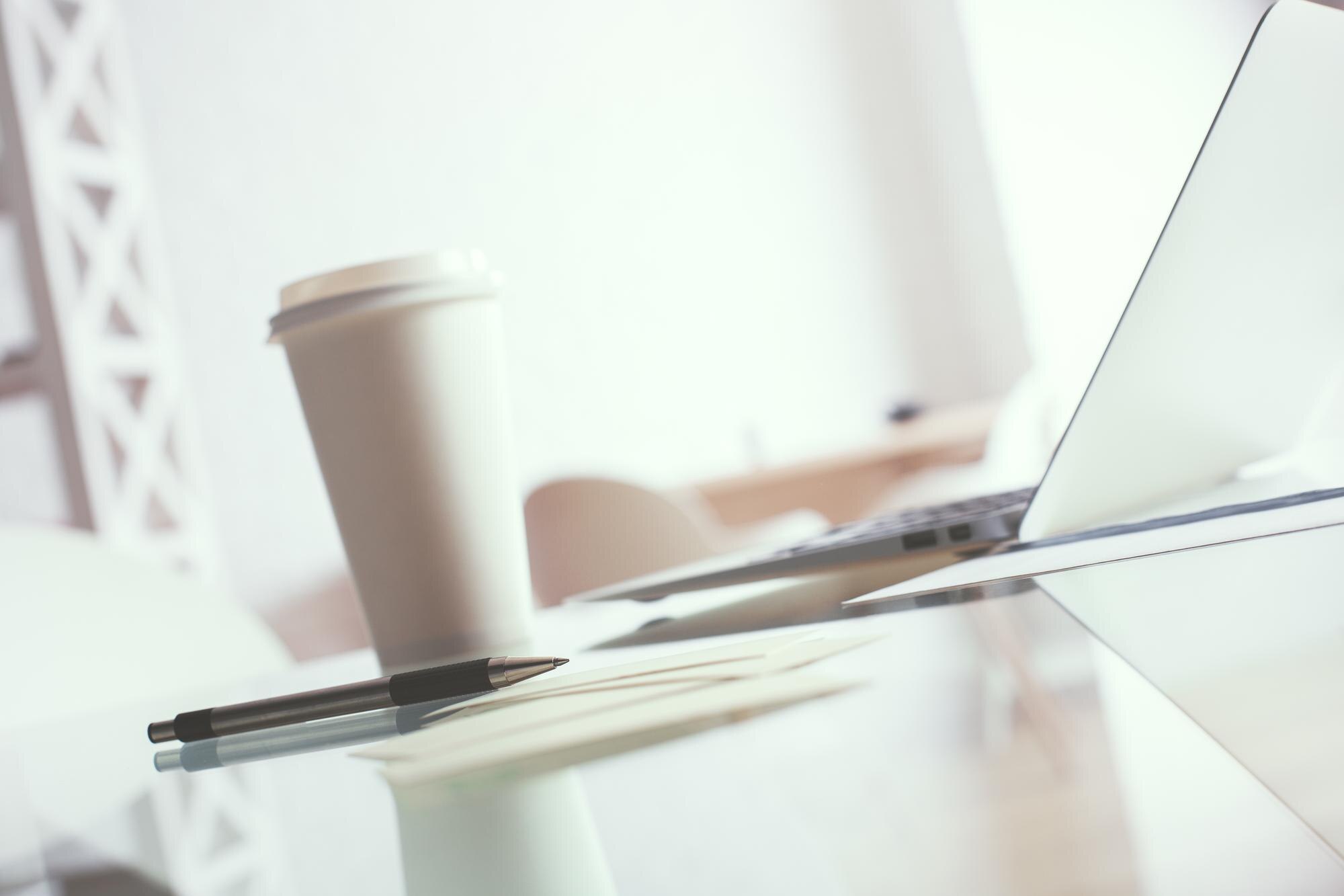 Crafting a Brand Experience as Iconic as Taylor Swift: Your Guide to Unforgettable Brand Identity 29 workspace with coffee and other items d443f953005d1164ce65