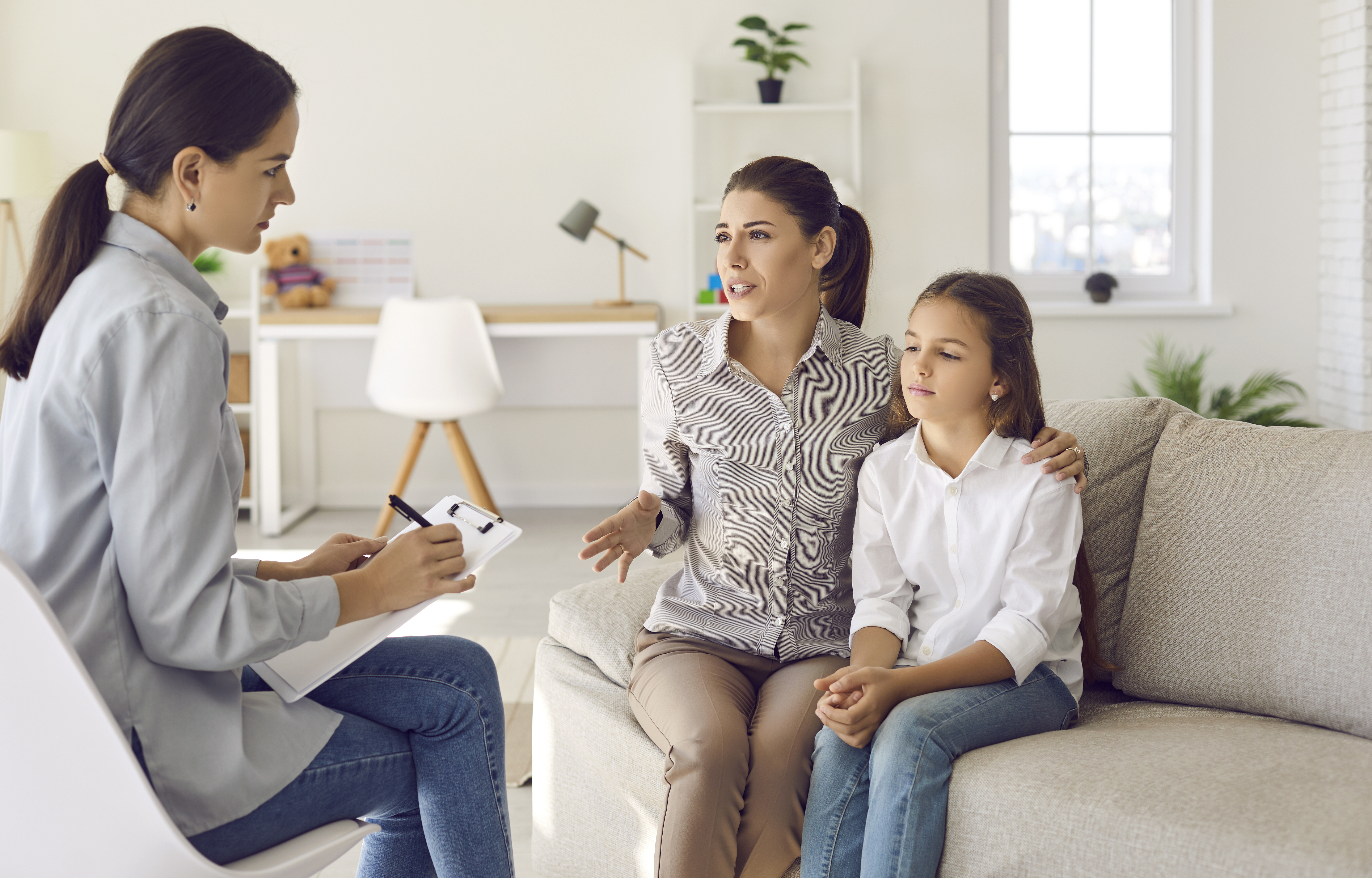 worried mother having conversation with counseling f8565fc46d940f614fa9