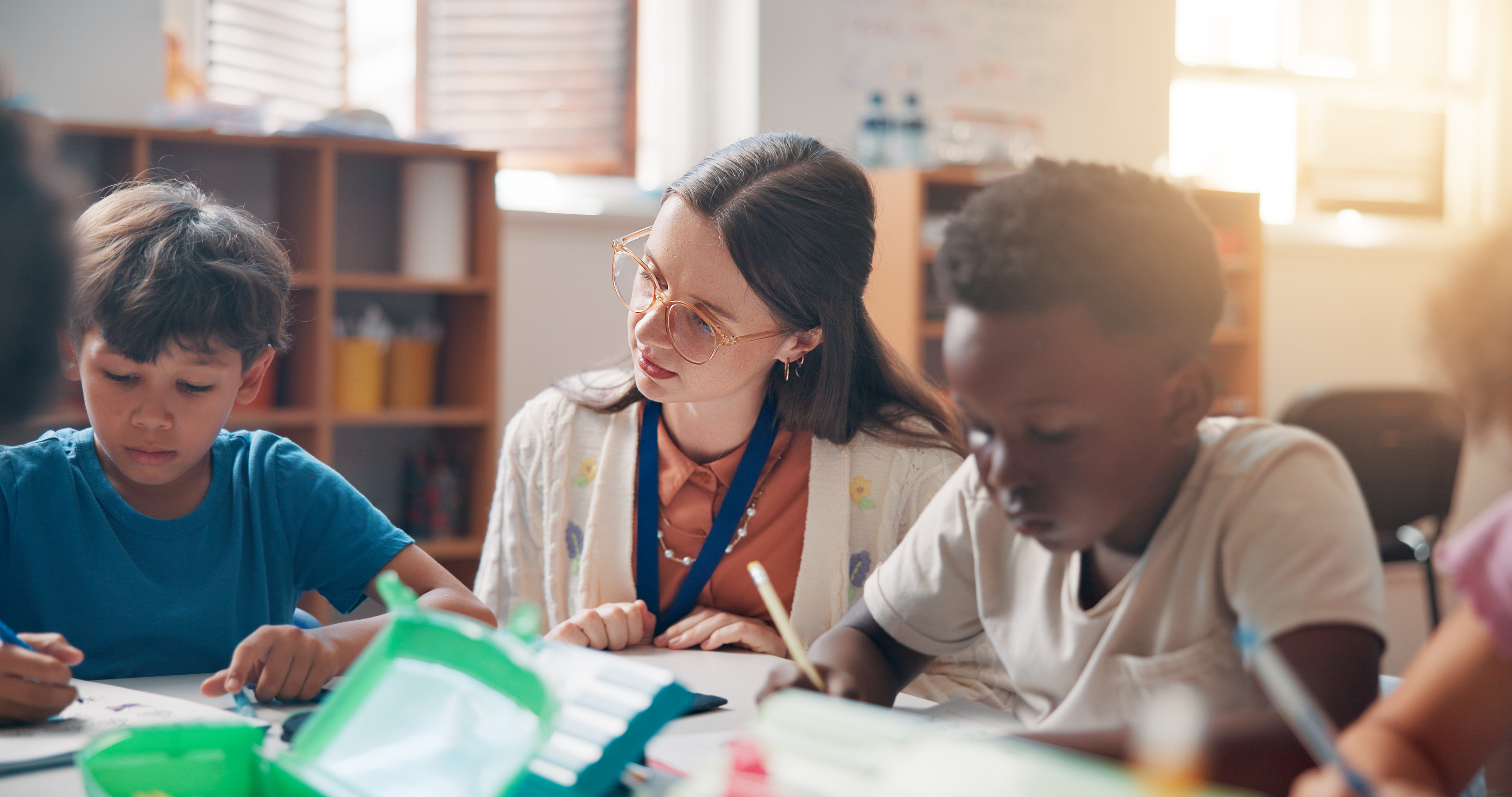 Writing Education And Teacher Helping Kids In Cla 74df34698b0d0cb7810b