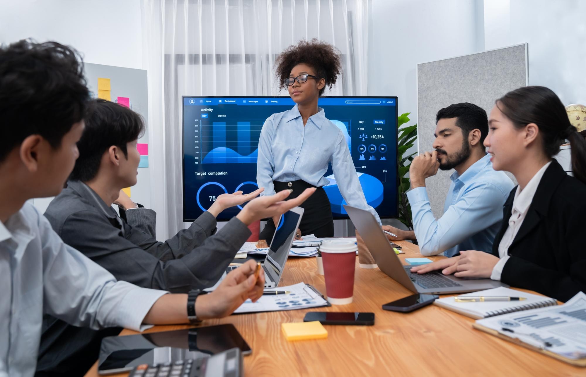 Measuring the Impact of LLM Visibility for Your Business 55 young african businesswoman presenting data analys 063487378351b9c67c07