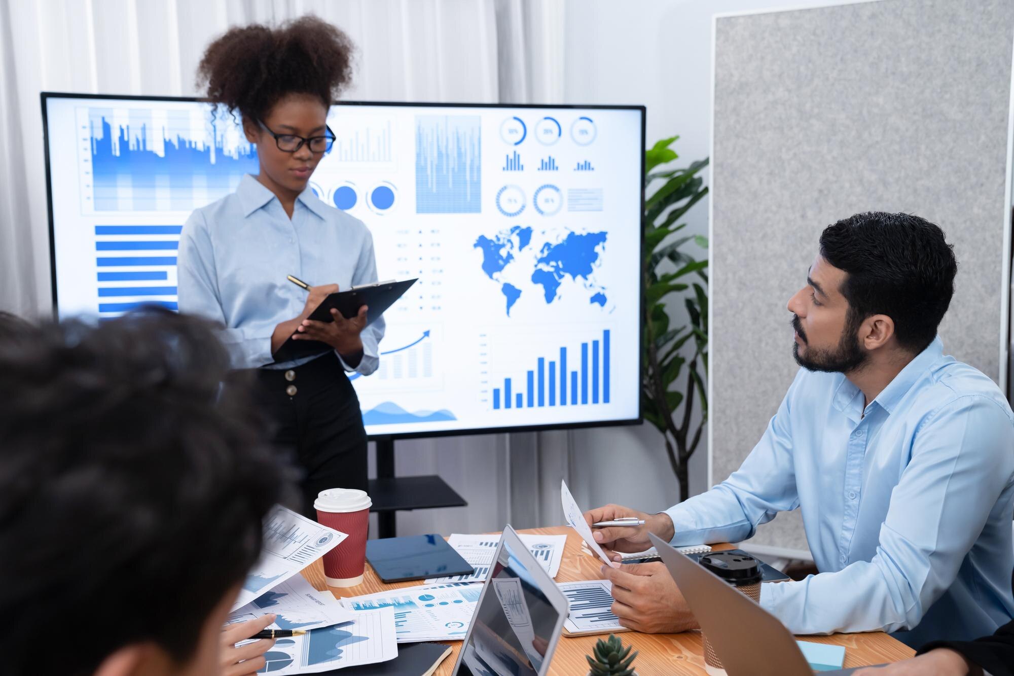 A business professional presenting data analysis, representing website optimisation strategies.