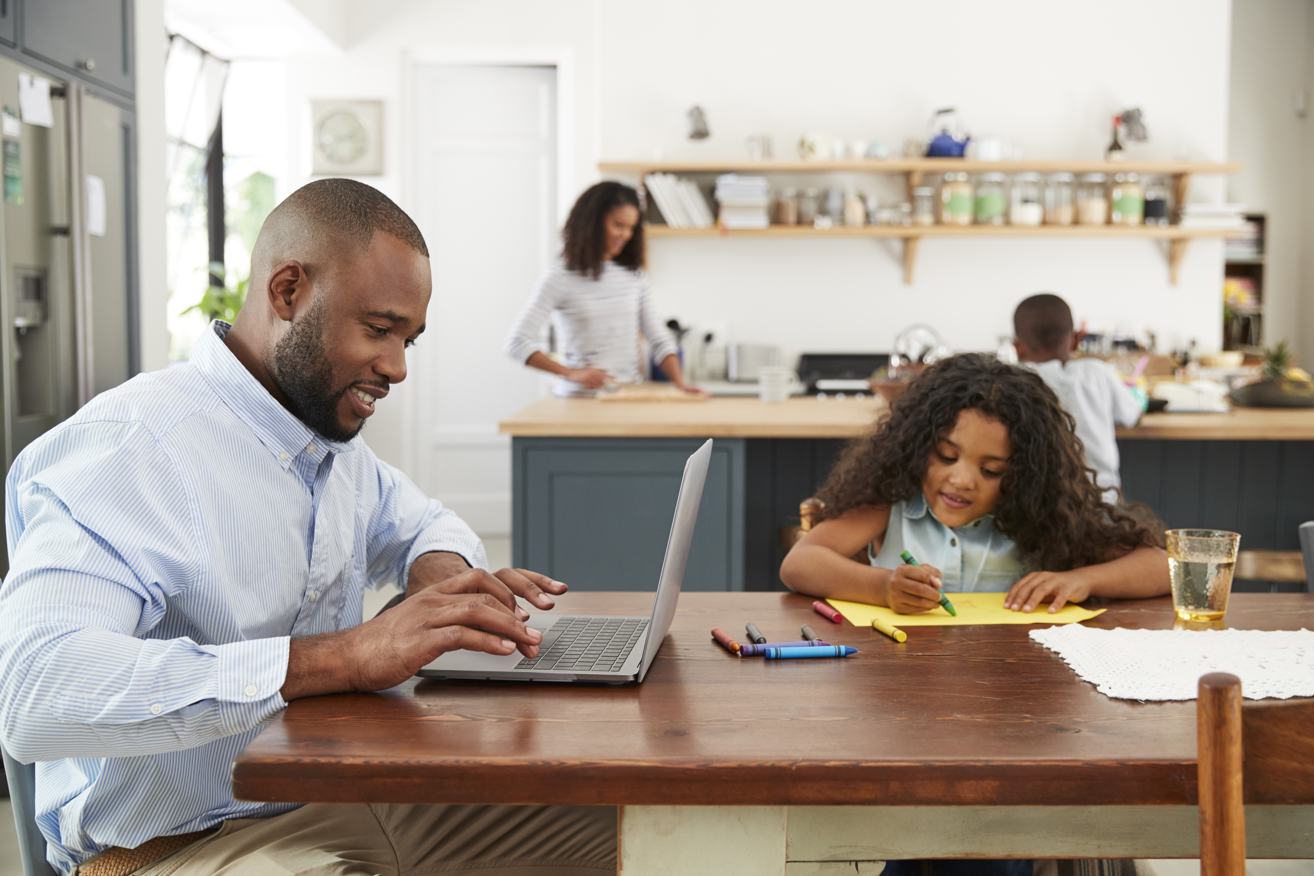 Young Black Family Busy Working In Their Kitchen A181e731becbbb110e8f