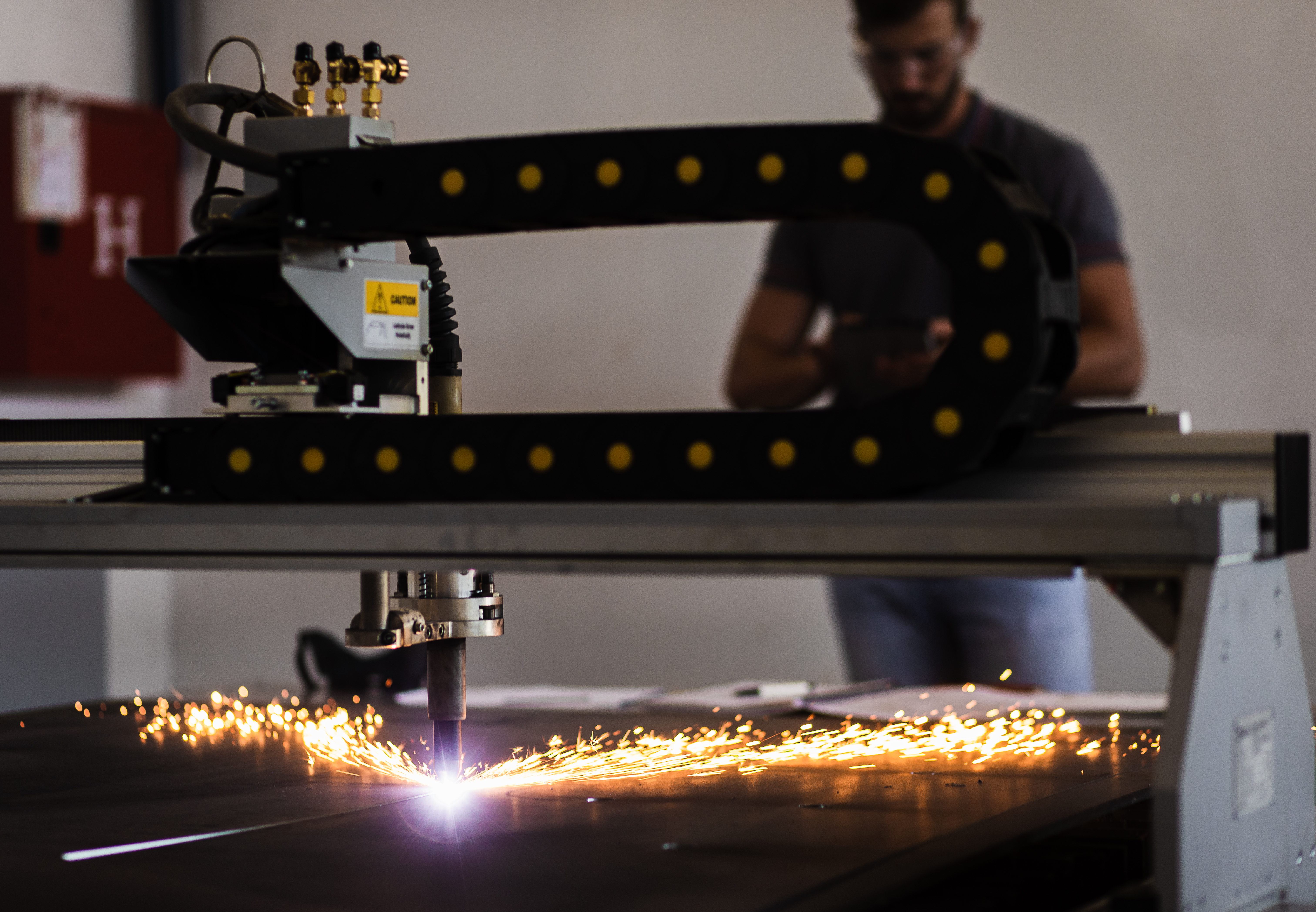 CNC laser vs water jet cutting for plastics: which method suits your project? 2 young engineer setup plasma cutter for work in met 4e6088dde22f75c448b8