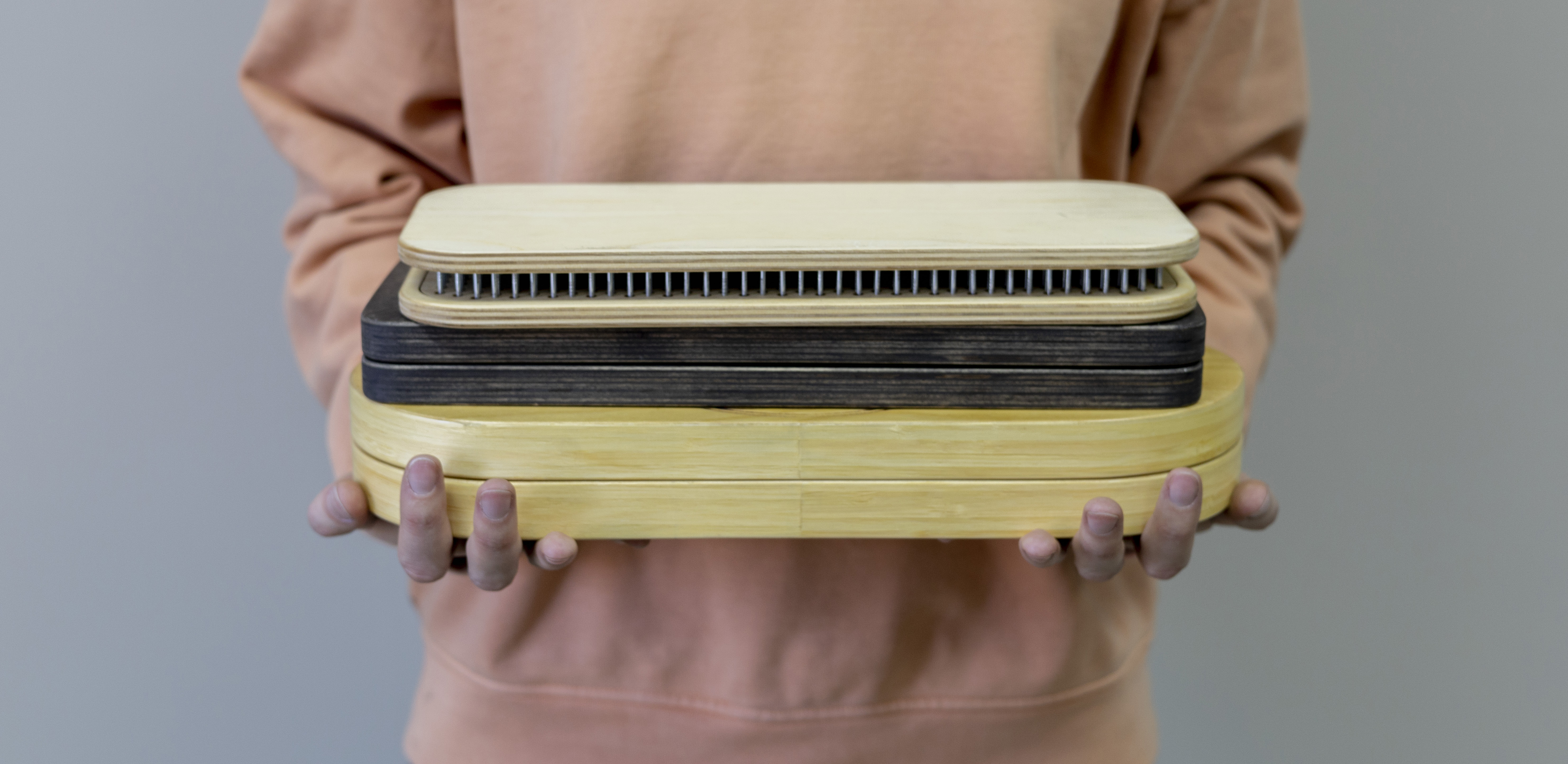 How Custom Plastic Fabrication Supercharges Product Customisation and Branding 2 young girl holds in her hands sadhu board peace o 82f0bc33508bf2770ec0