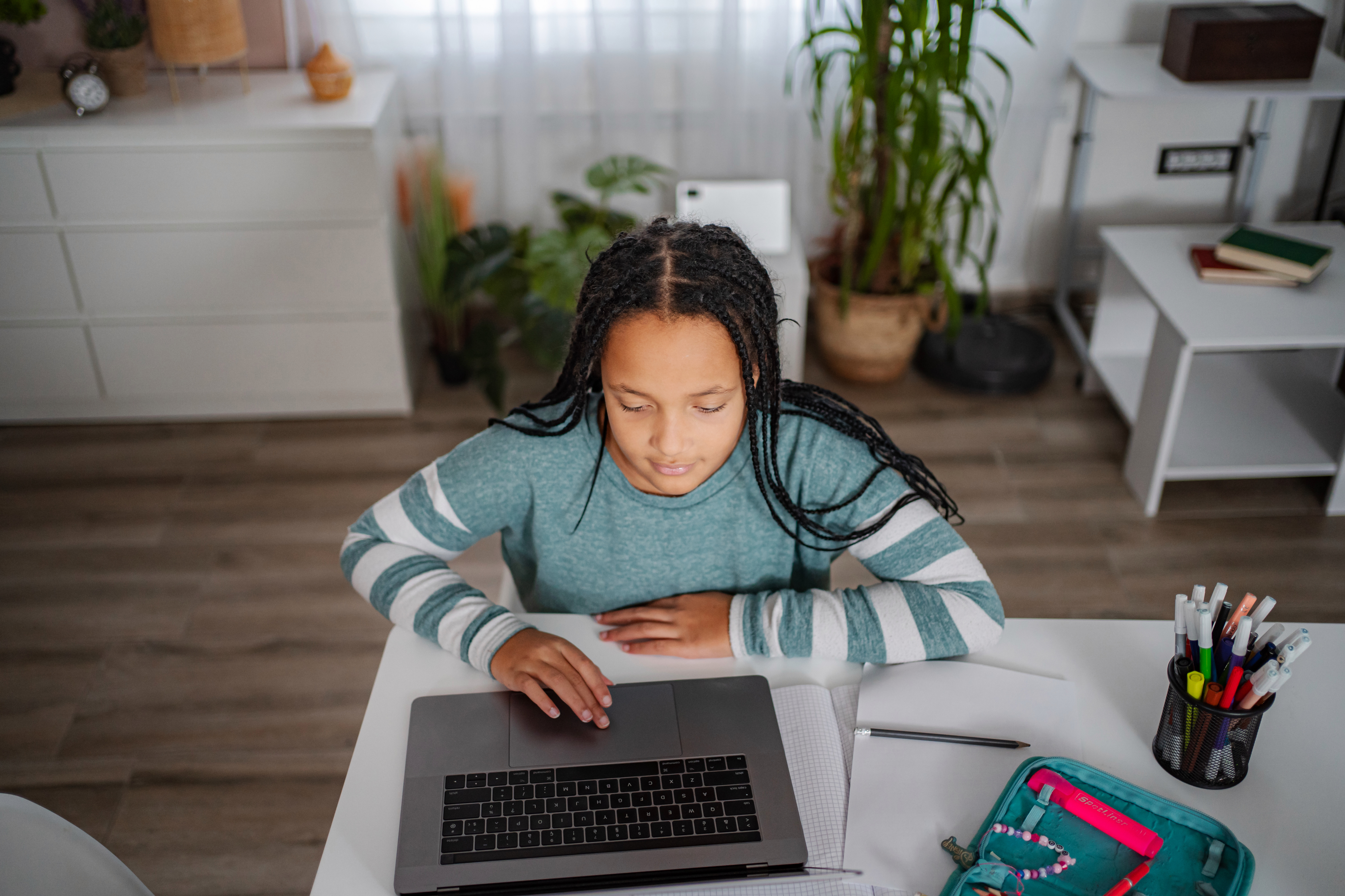 Young Girl Learning Online From Home Using Laptop 5a724f40d54c7ed09286