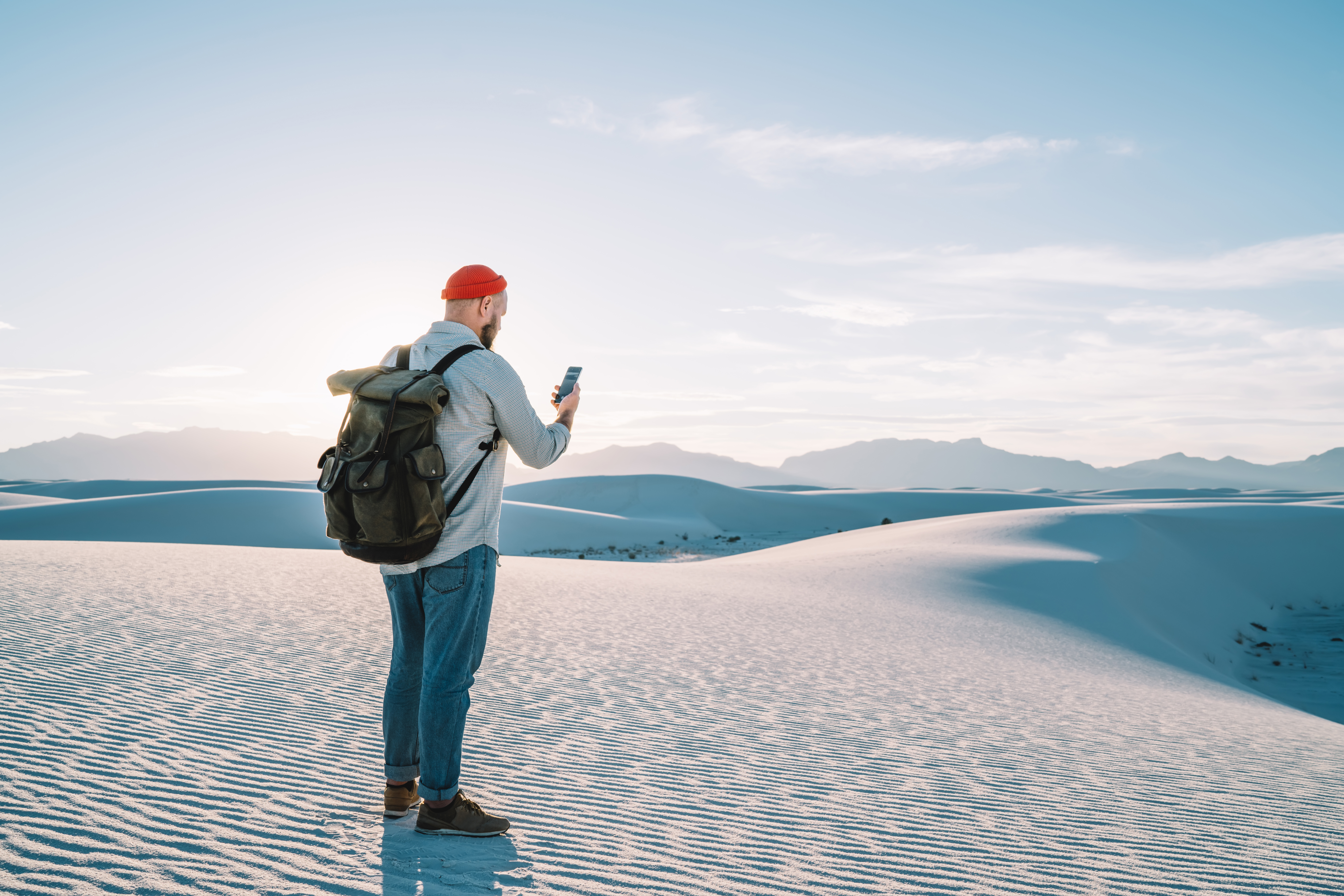 young male traveler with touristic backpack holdin 36ee85be2c9db81c08f1