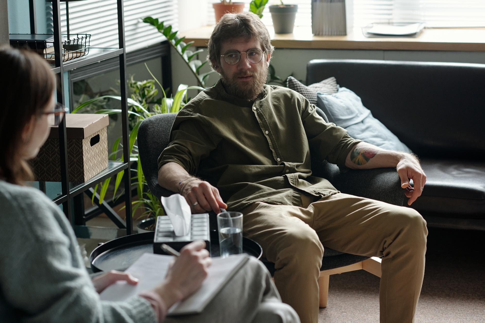 young man discussing personal issues during therap a87b74cb4ad6d2f691d0