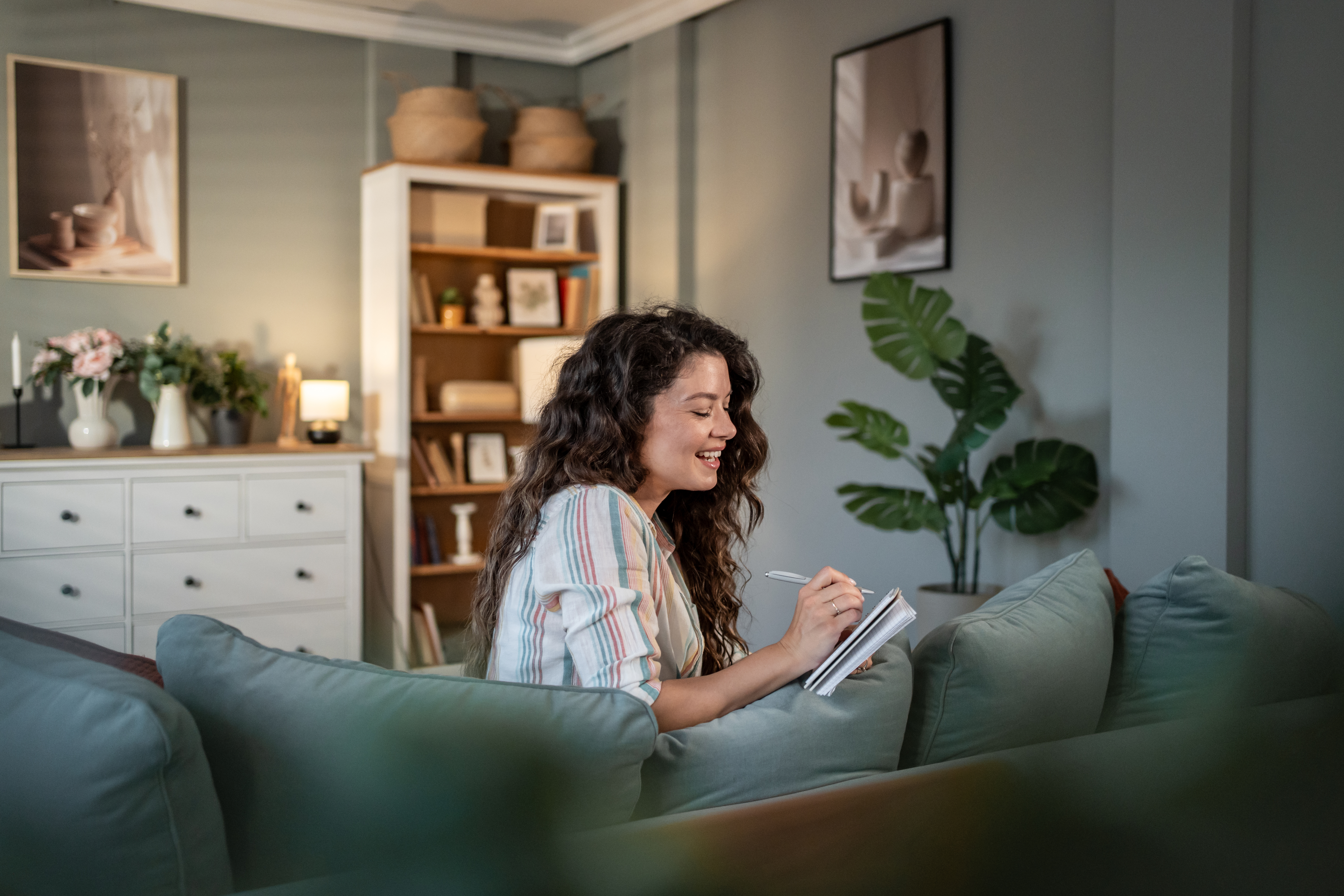 Why Quick Fixes Fail: Embracing The Slow And Steady Path To Personal Growth 3 Young Woman Writing On Notebook Sitting On Sofa At 18D7Dda6946D9E3C7Ed6