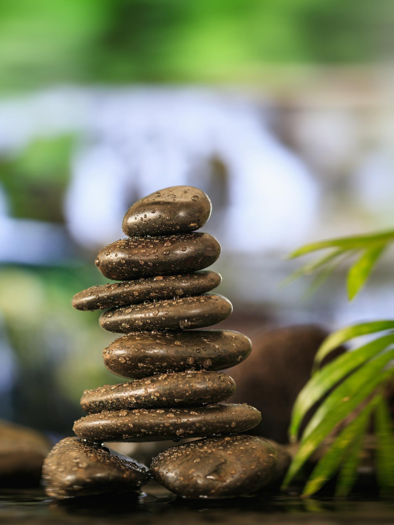 zen stones stack on abstract background 492ba2d9e4ad57a14a94