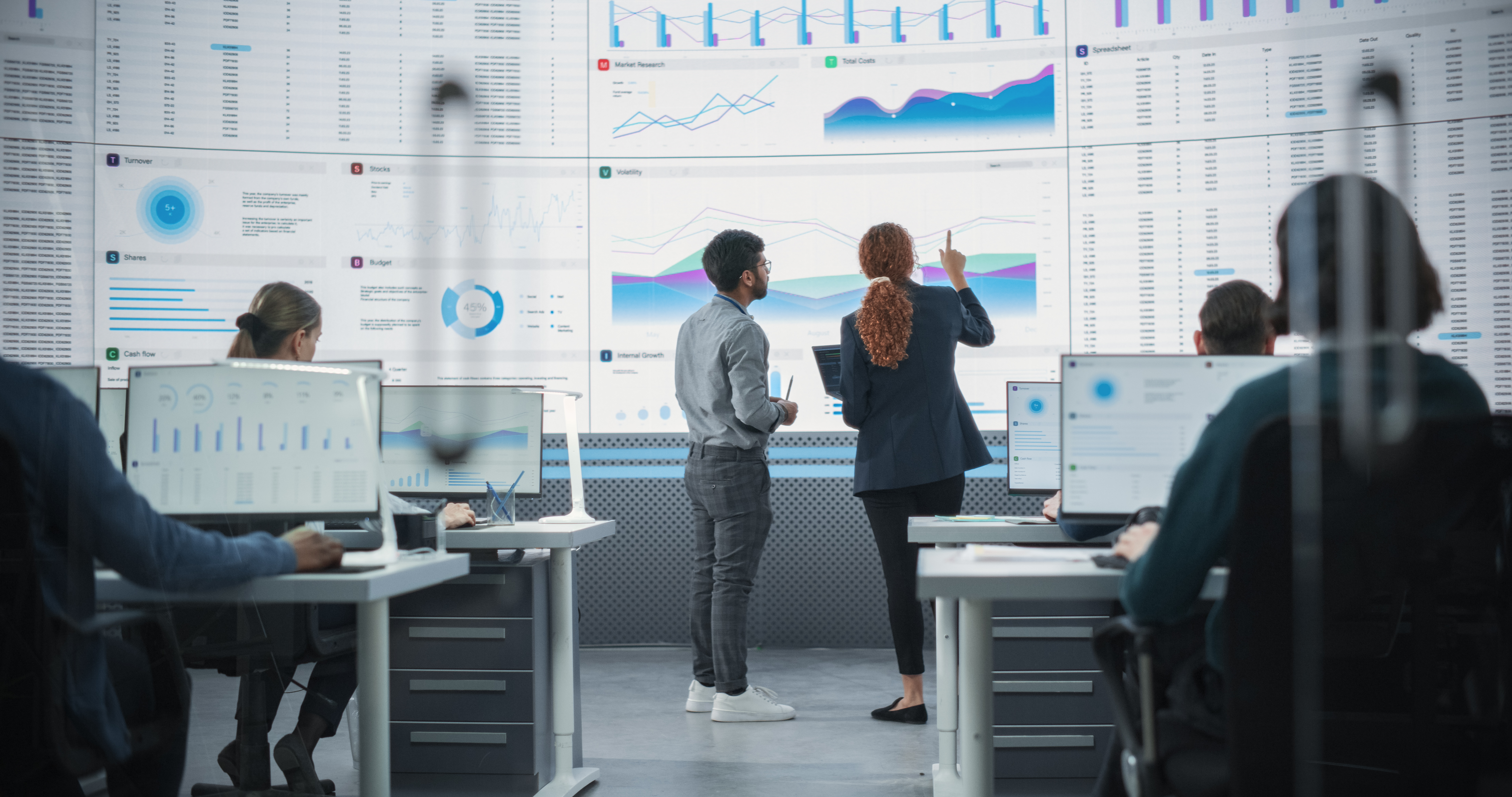 Why Shopify Plus Brands Are Automating Support Before Black Friday—and How It Impacts Your Q4 2 zoom out back view of indian man and hispanic woma 183efb0e55863c28e11f